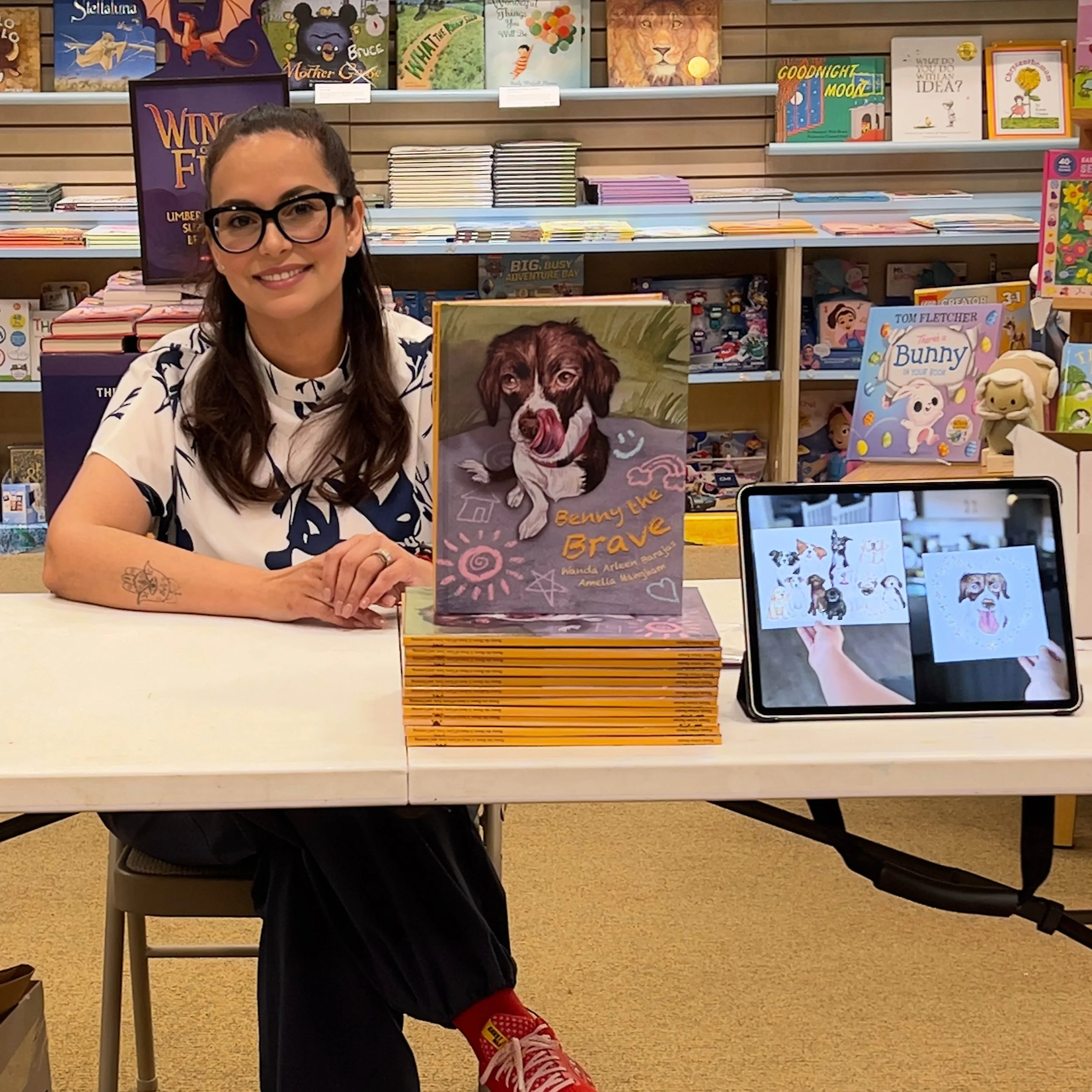 Author Wanda Arleen Barajas at bookstore signing books.