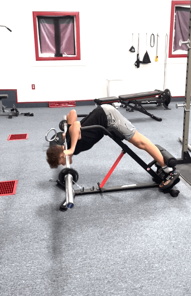 Athlete performing a back extension