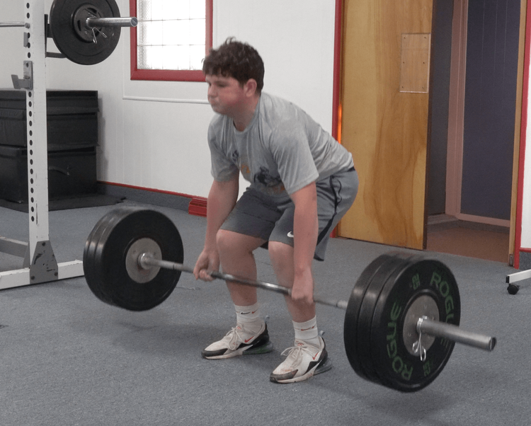 Athlete deadlifting
