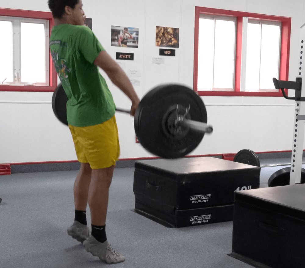 Athlete performing a power clean