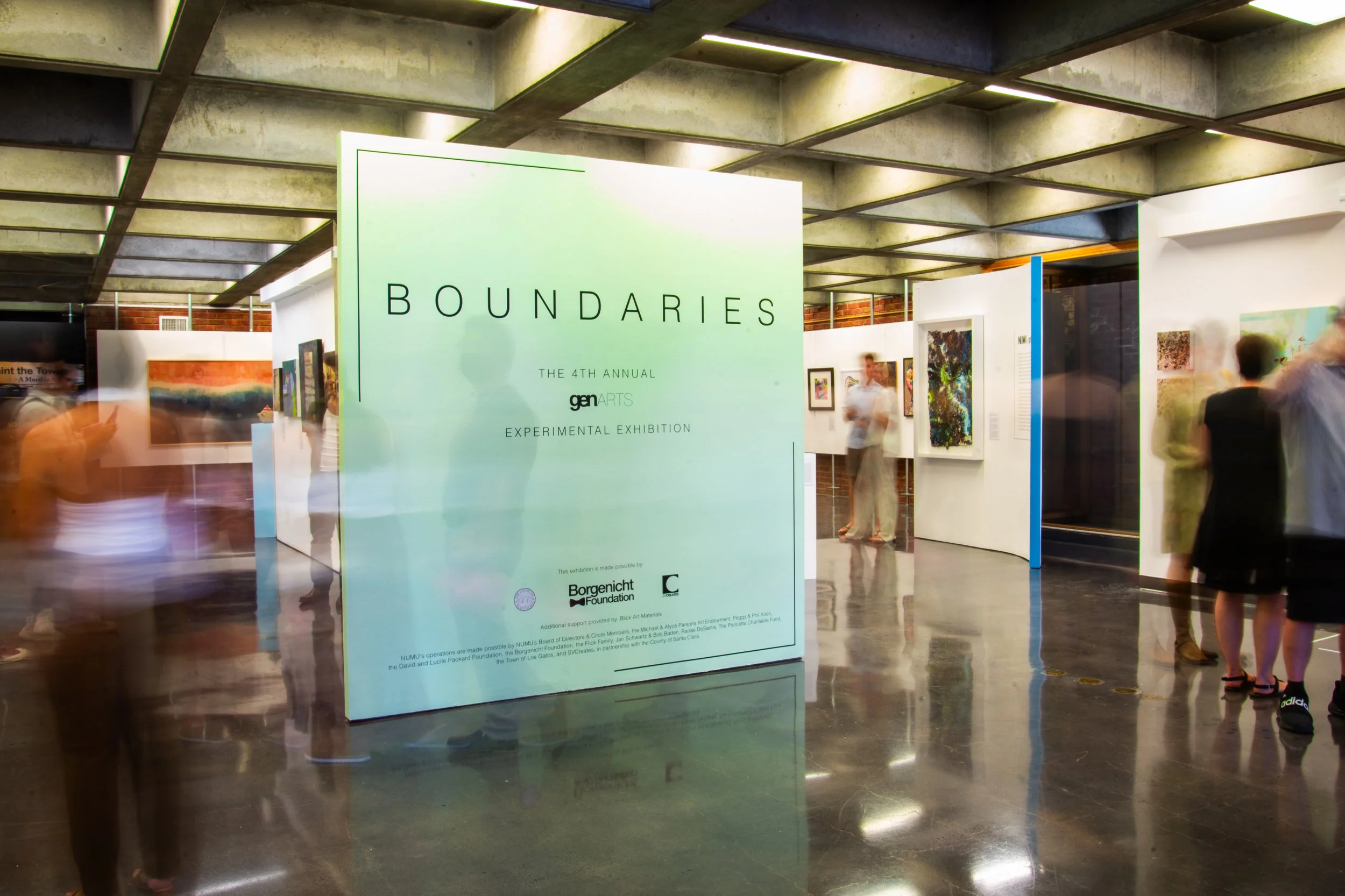The image shows an art exhibition titled 'Boundaries' at the 4th Annual genARTS Experimental Exhibition, with various colorful artworks displayed on the walls and visitors observing the art pieces.