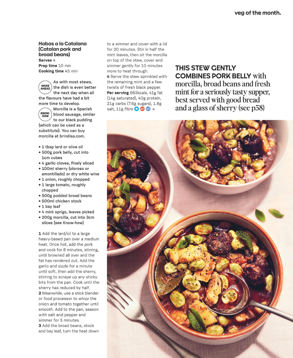 Three bowls of stew containing pork, broad beans, and herbs, on a pink napkin with a fork and spoon.
