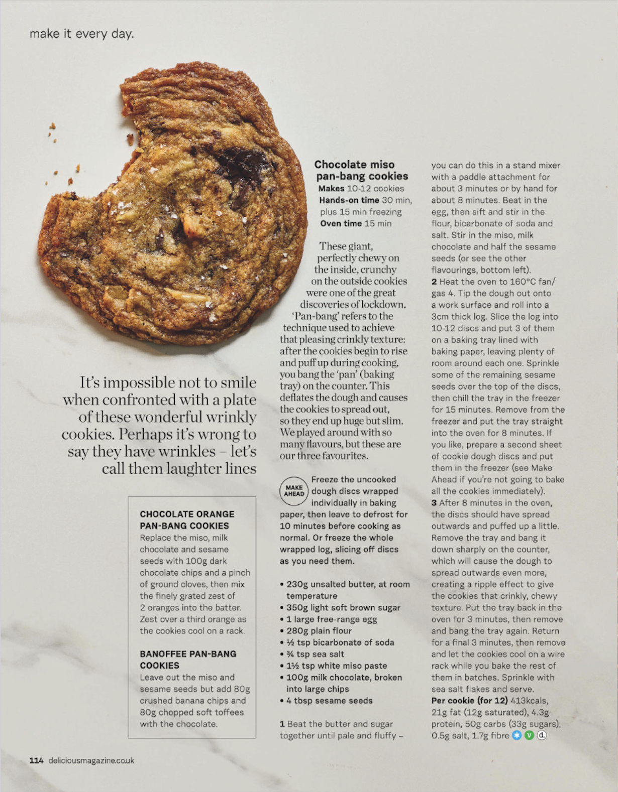 A chocolate chip cookie with a bite taken out of it, on a white surface. The recipe for chocolate miso pan-bang cookies is visible on the page.