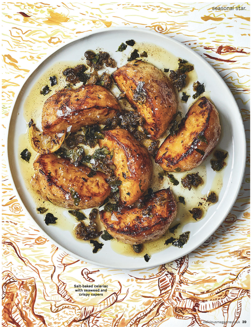 Salt-baked celeriac with seaweed and crispy capers served on a white plate.