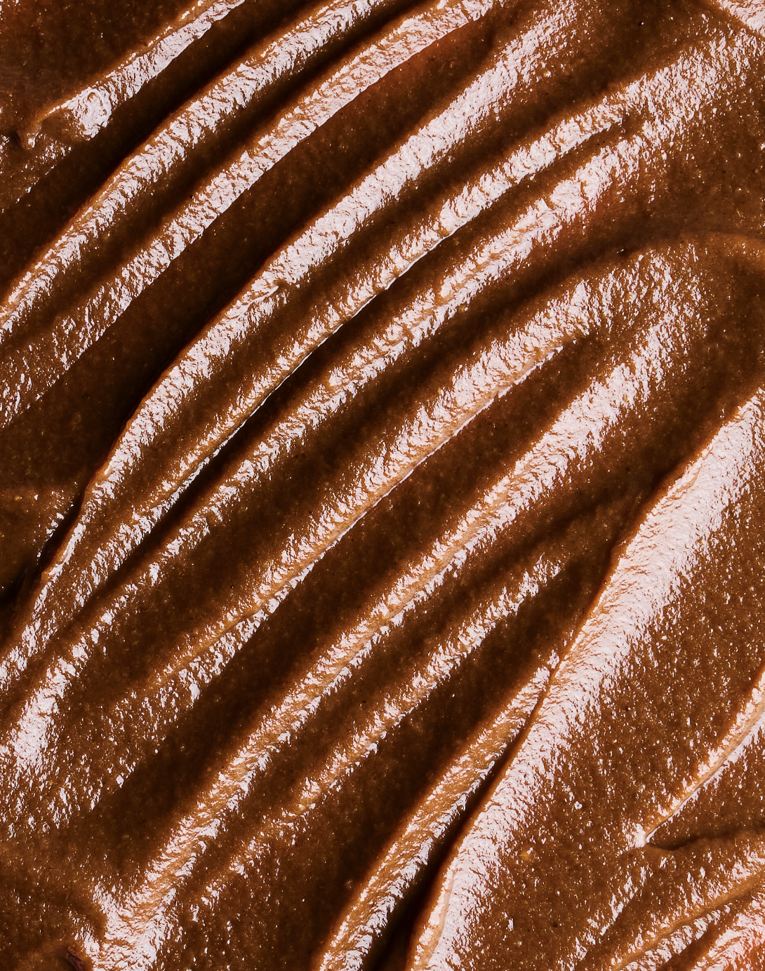 Close-up of cooked steak with grill marks.