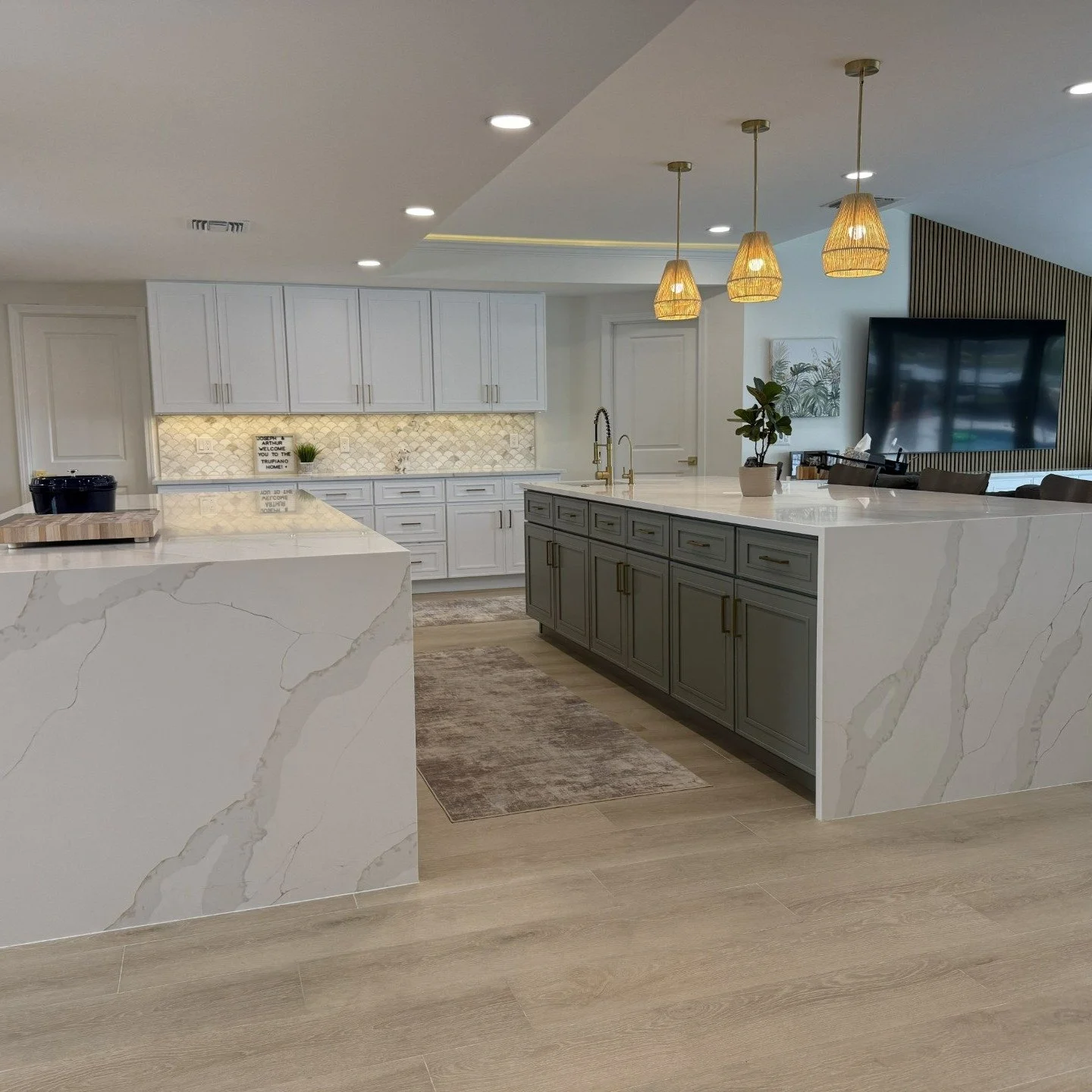 Waterfront living deserves a kitchen to match.

This complete renovation features over 20 feet of island space, custom cabinetry, quartz waterfall countertops, integrated lighting, and a timeless coastal-modern design.

Every square foot was reimagin