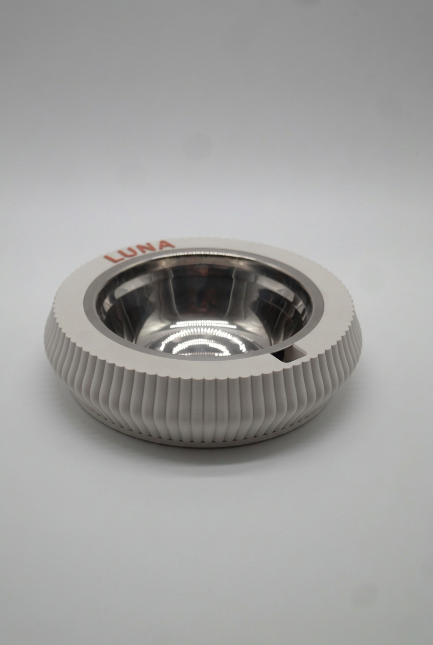 Bone White KAZE pet bowl at an angle, with the name LUNA in raised terracotta letters on the rim.
