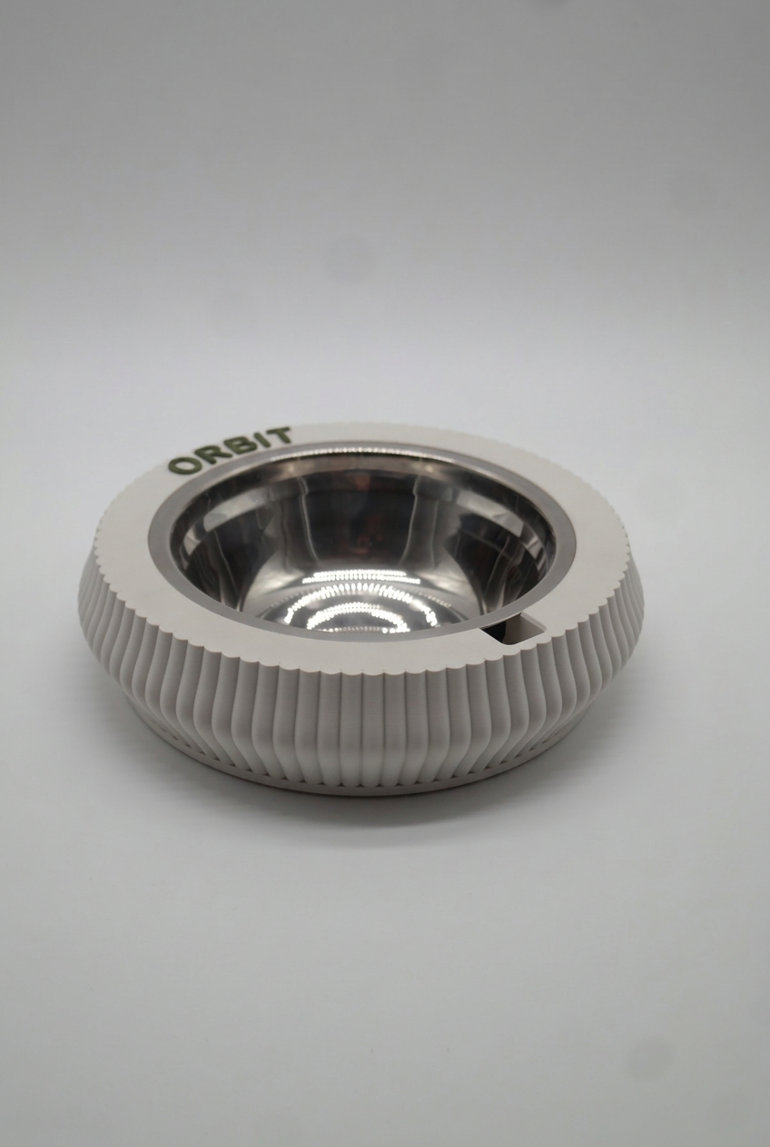 Bone White KAZE pet bowl at an angle, with the name ORBIT in raised dark green letters on the rim.