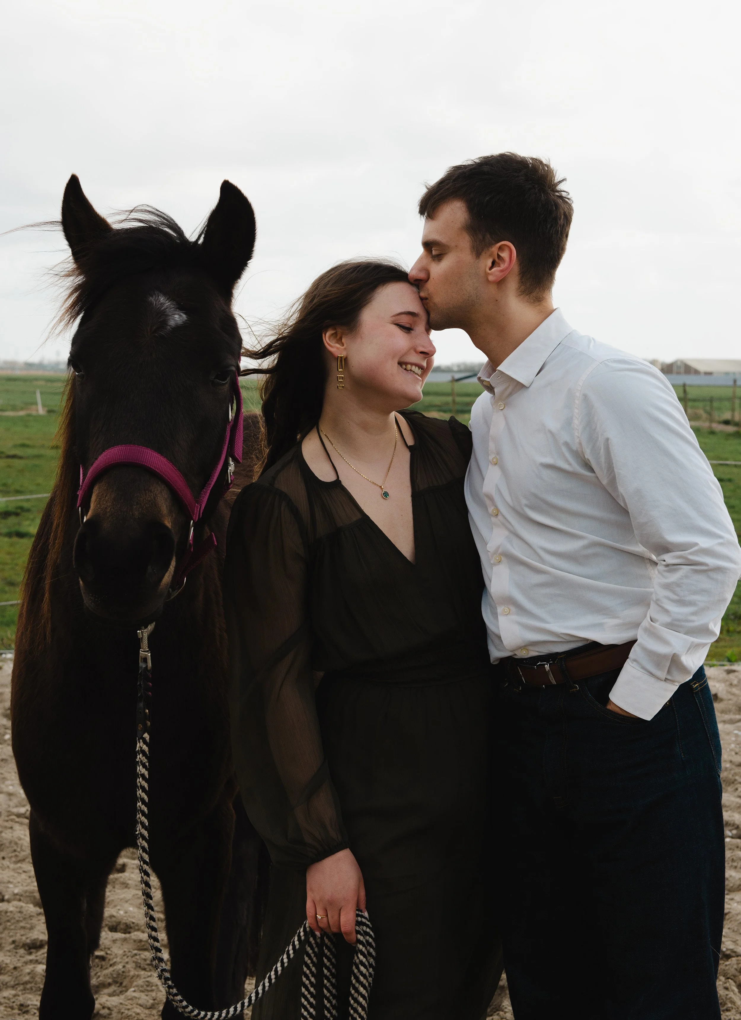 engagement-couple-green-dress-horse-stable-on-location-amsterdam-photographer.j.jpg