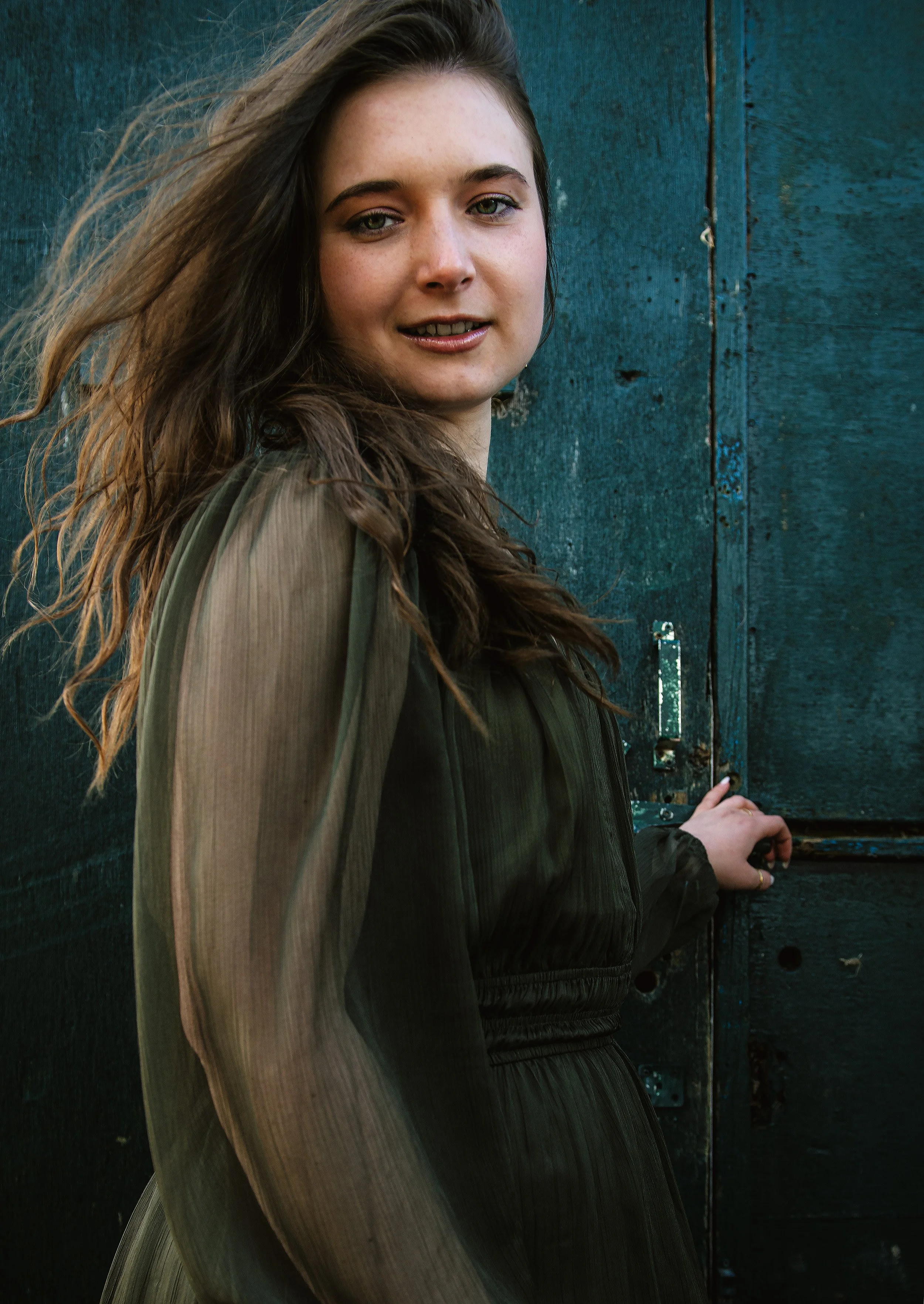 portrait-of-woman-with-long-hair-in-green-dress.jpg.jpg