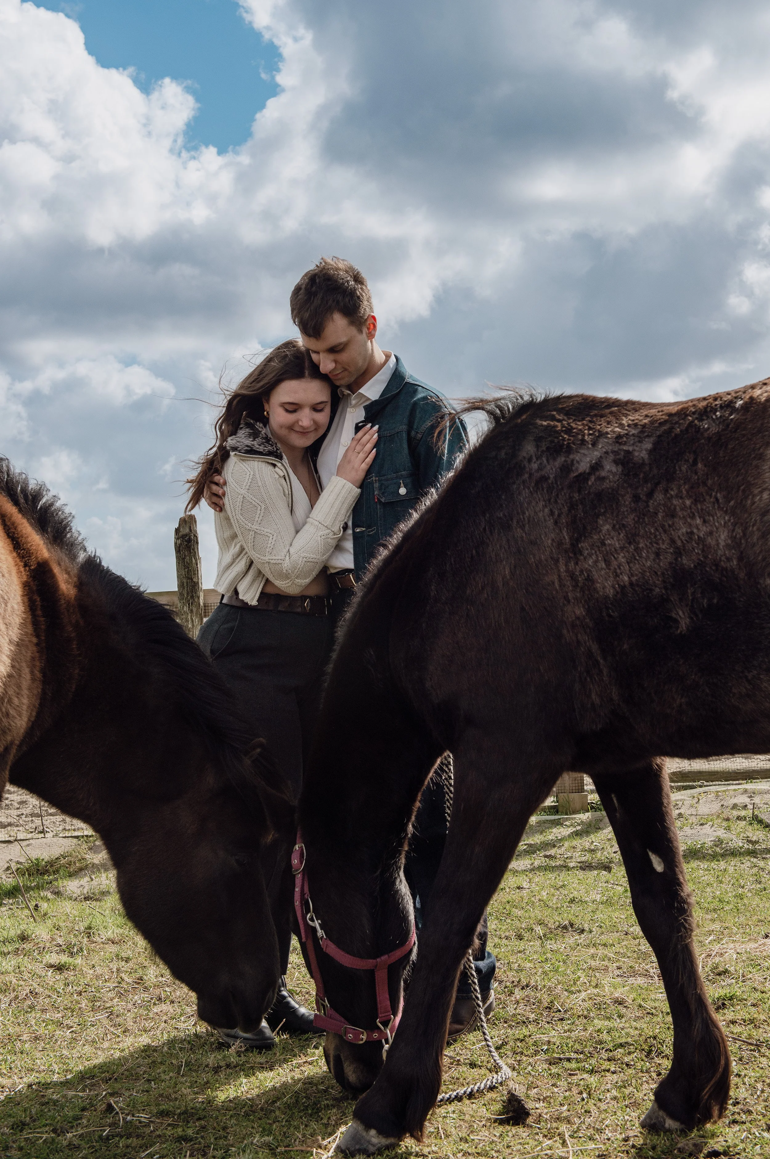 romantic-engagement-couple-with-horses-in-the-fields-springjpg.jpg