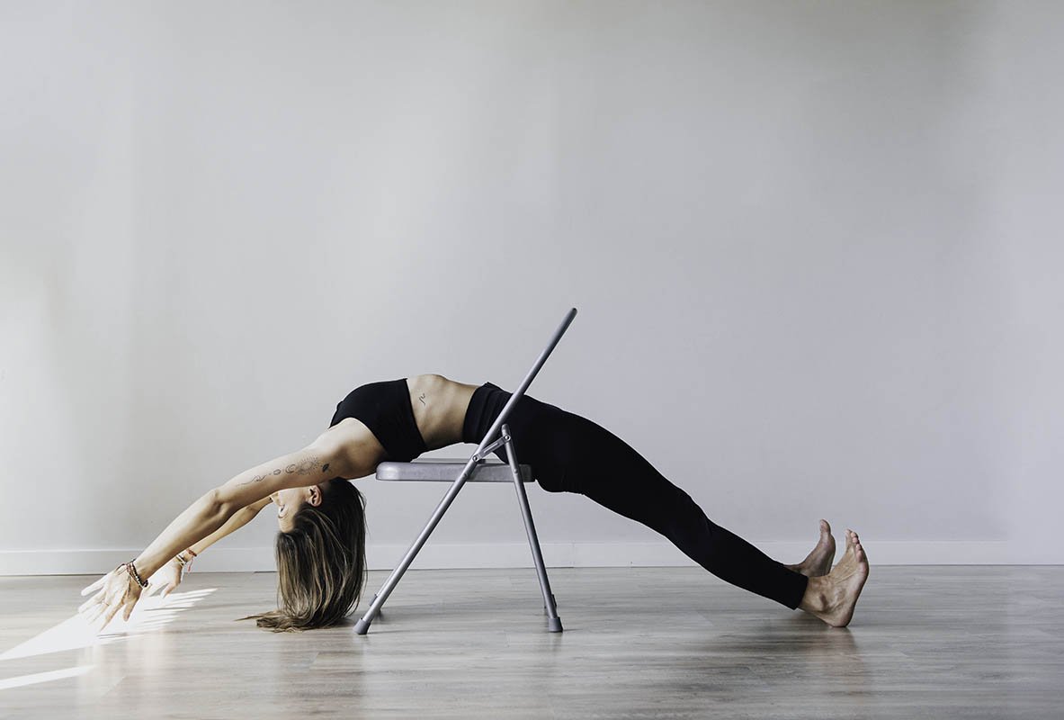 branding photography, yoga teacher on the chair,  doing yoga poses, life style photography, branding, portrait photography, Izabela Bartnicka photography