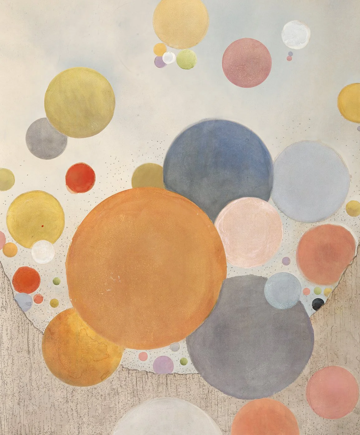 Different colored circles that look like balloons floating with a pale background