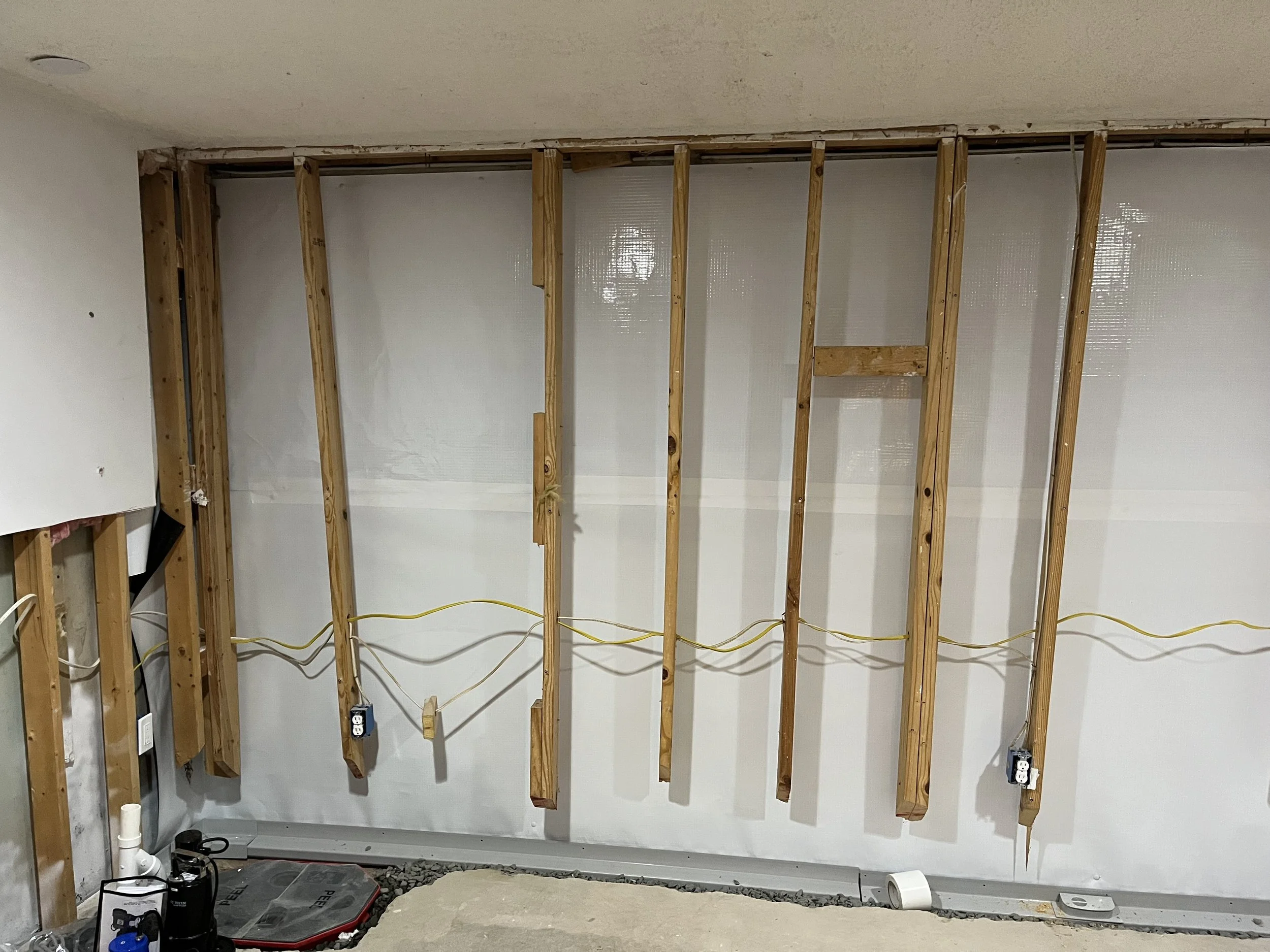 Oranssi technician working on a roof project