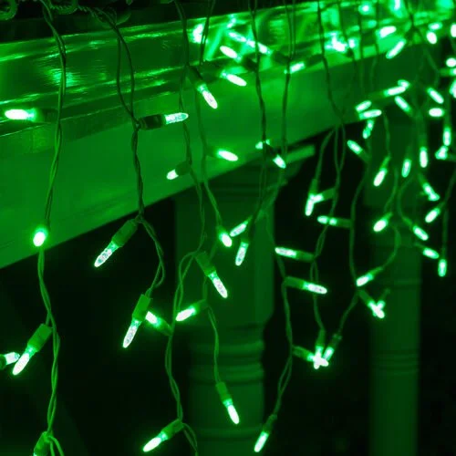Close-up of the green icicle Christmas lights option available for exterior christmas light decoration from Neon Noel LLC in Northeast Texas