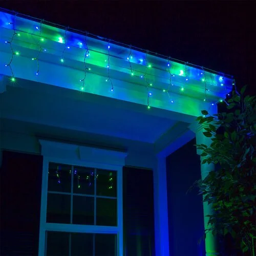 Close-up of the blue and green icicle Christmas lights option available for exterior christmas light decoration from Neon Noel LLC in Northeast Texas