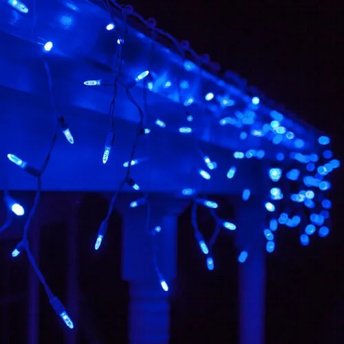 Close-up of the blue icicle Christmas lights option available for exterior christmas light decoration from Neon Noel LLC in Northeast Texas