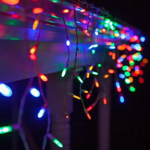 Close-up of the multicolor icicle Christmas lights option available for exterior christmas light decoration from Neon Noel LLC in Northeast Texas
