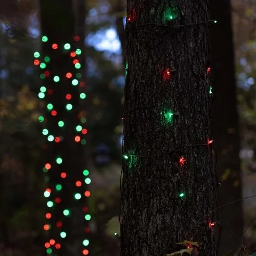 Close-up of the red and green tree wrap Christmas lights option available for exterior christmas light decoration from Neon Noel LLC in Paris, Texas