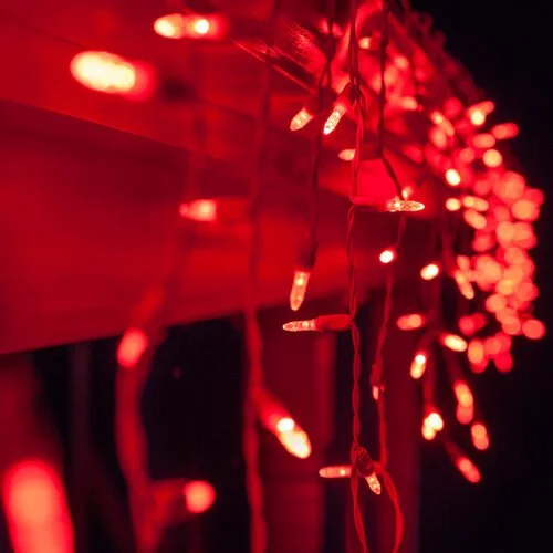 Close-up of the red icicle Christmas lights option available for exterior christmas light decoration from Neon Noel LLC in Northeast Texas