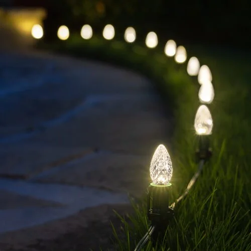 Close-up of the earm white pathway Christmas lights option available for exterior christmas light decoration from Neon Noel LLC in Paris, Texas