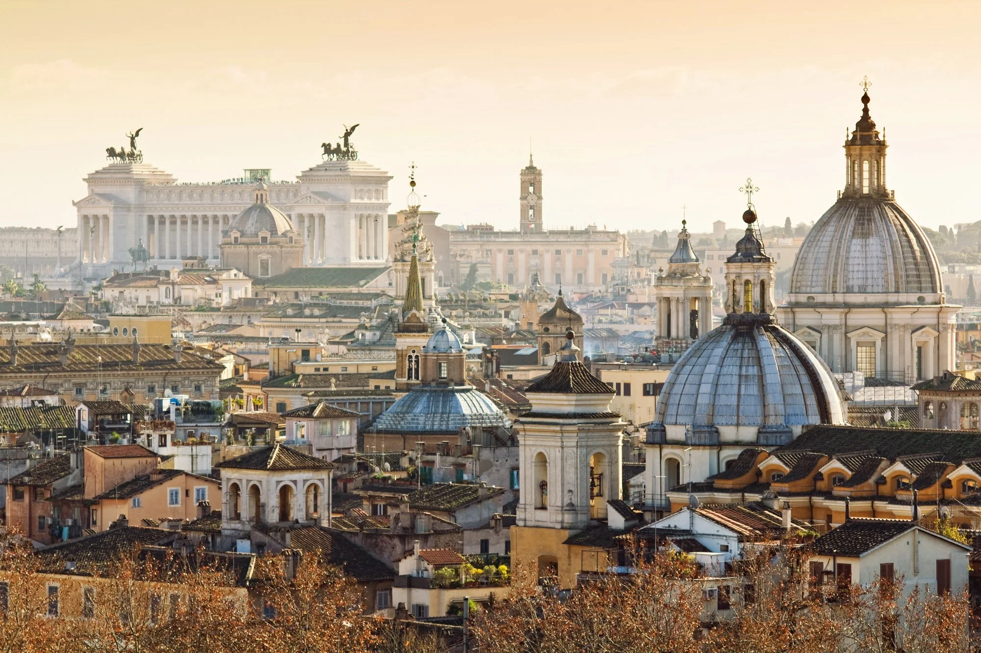 Fine art print photography for modern living room wall decor in Zürich.. Cityscape of Rome featuring domes, church towers, and historical buildings during sunset.