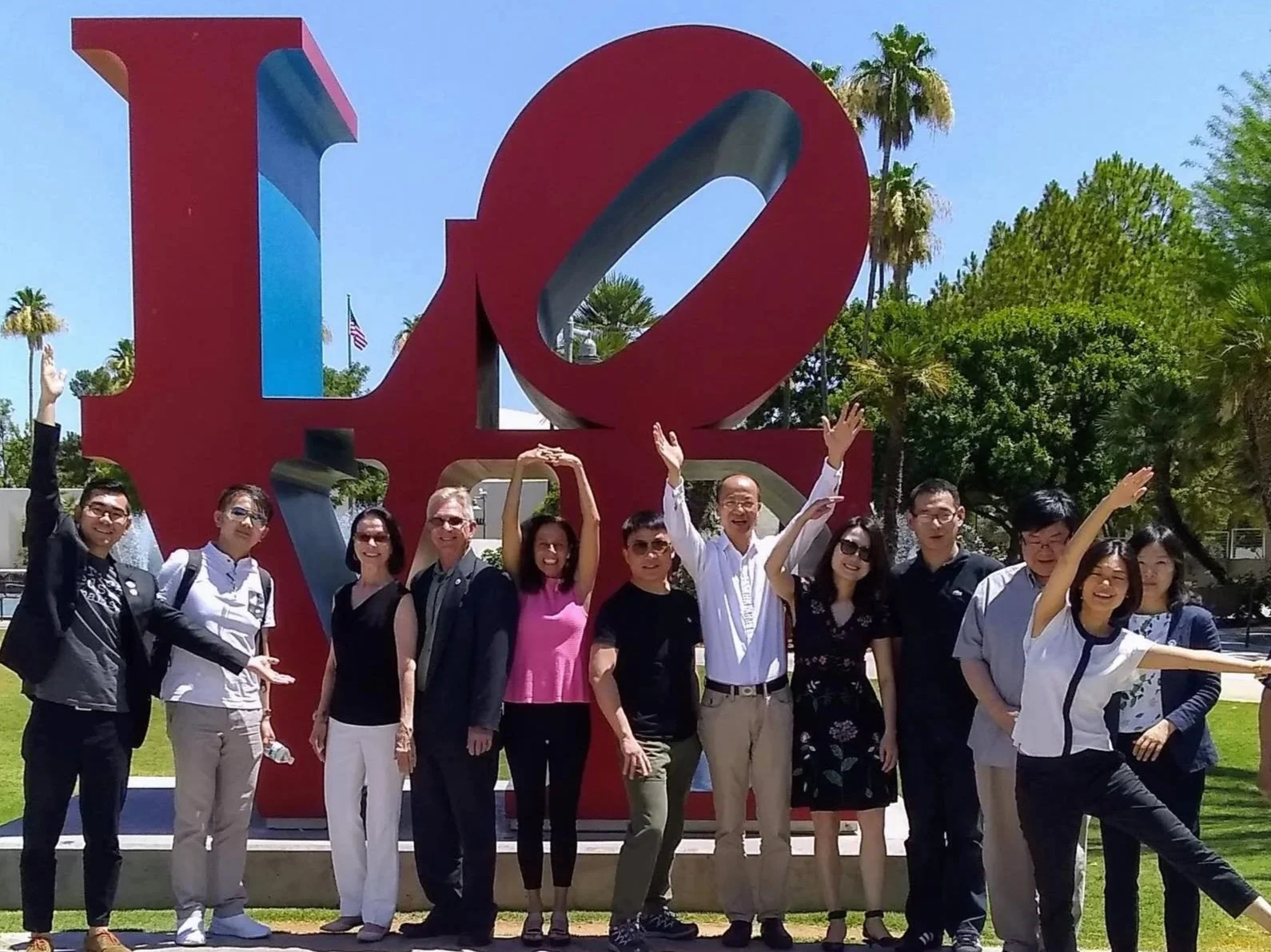 Copy+of+LoveStatuewithChineseJournalists.jpg
