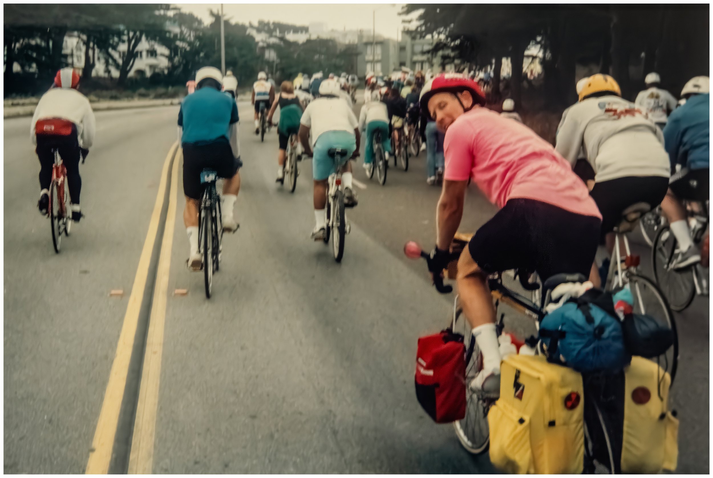 Our friend Don, riding with the Tour de San FRANCEisco crowd up Point Lobos Avenue, usually a busy road full of cars. (Click photo for Geotag)