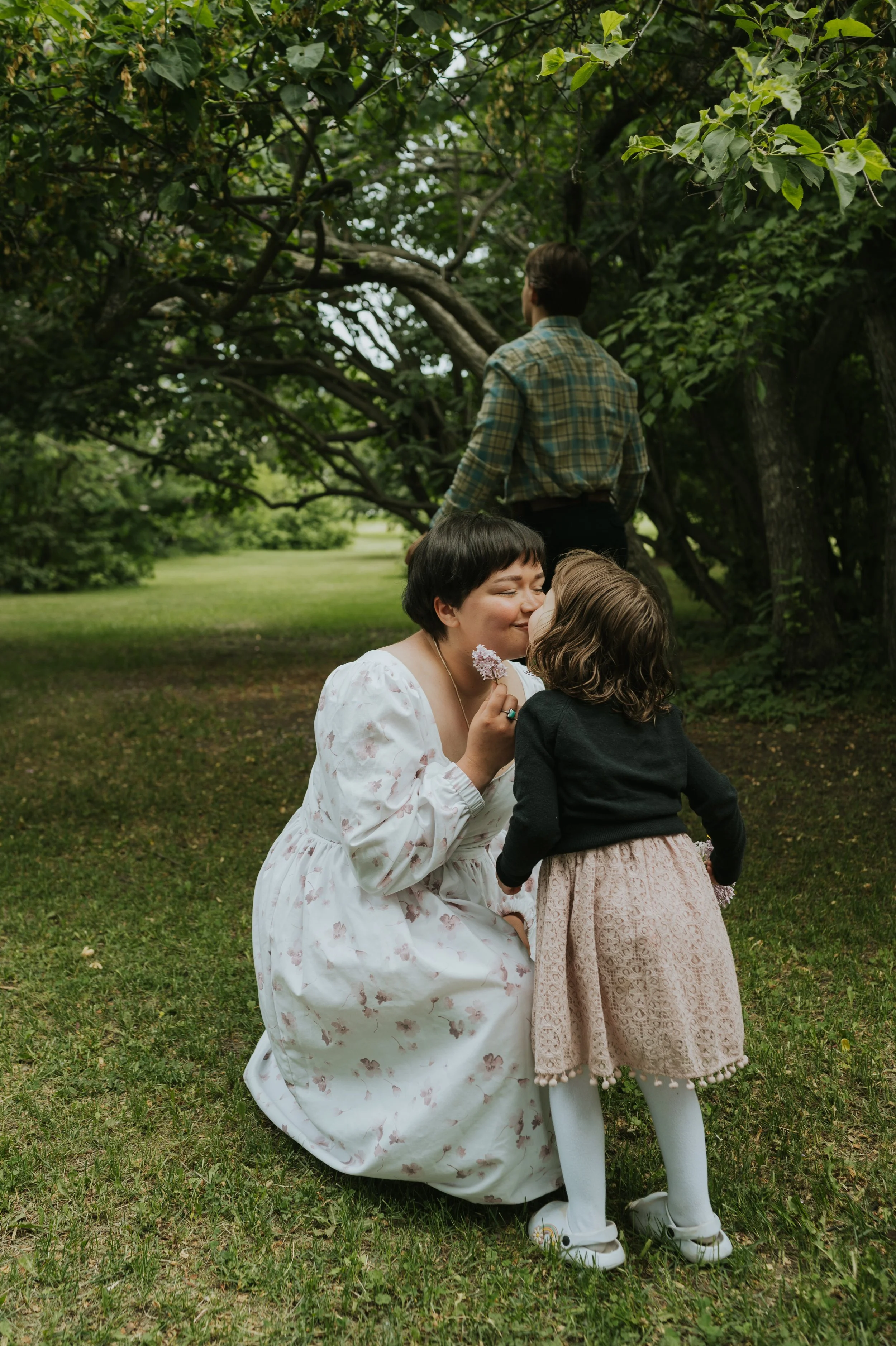 mom and daughter touching noses