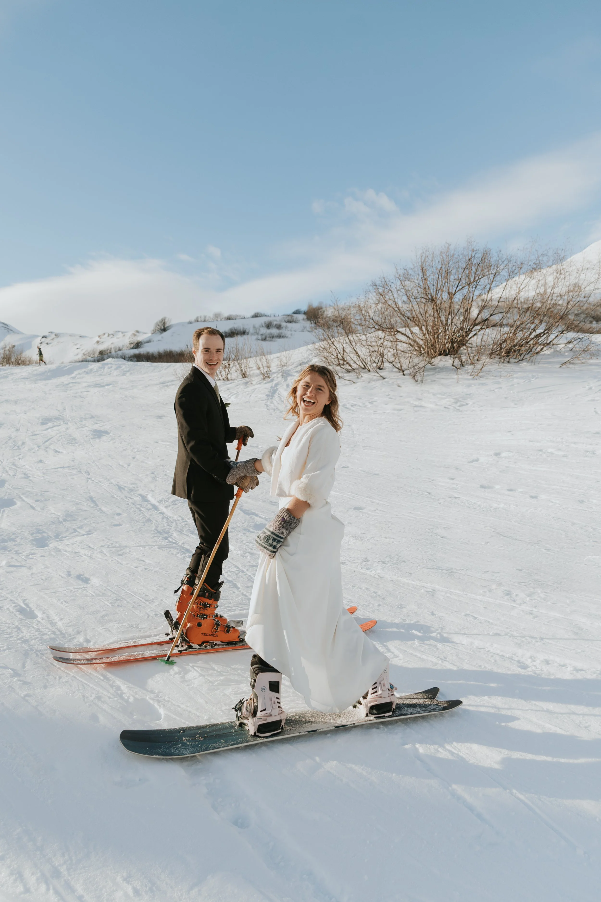 wedding couple skiing and snowboarding