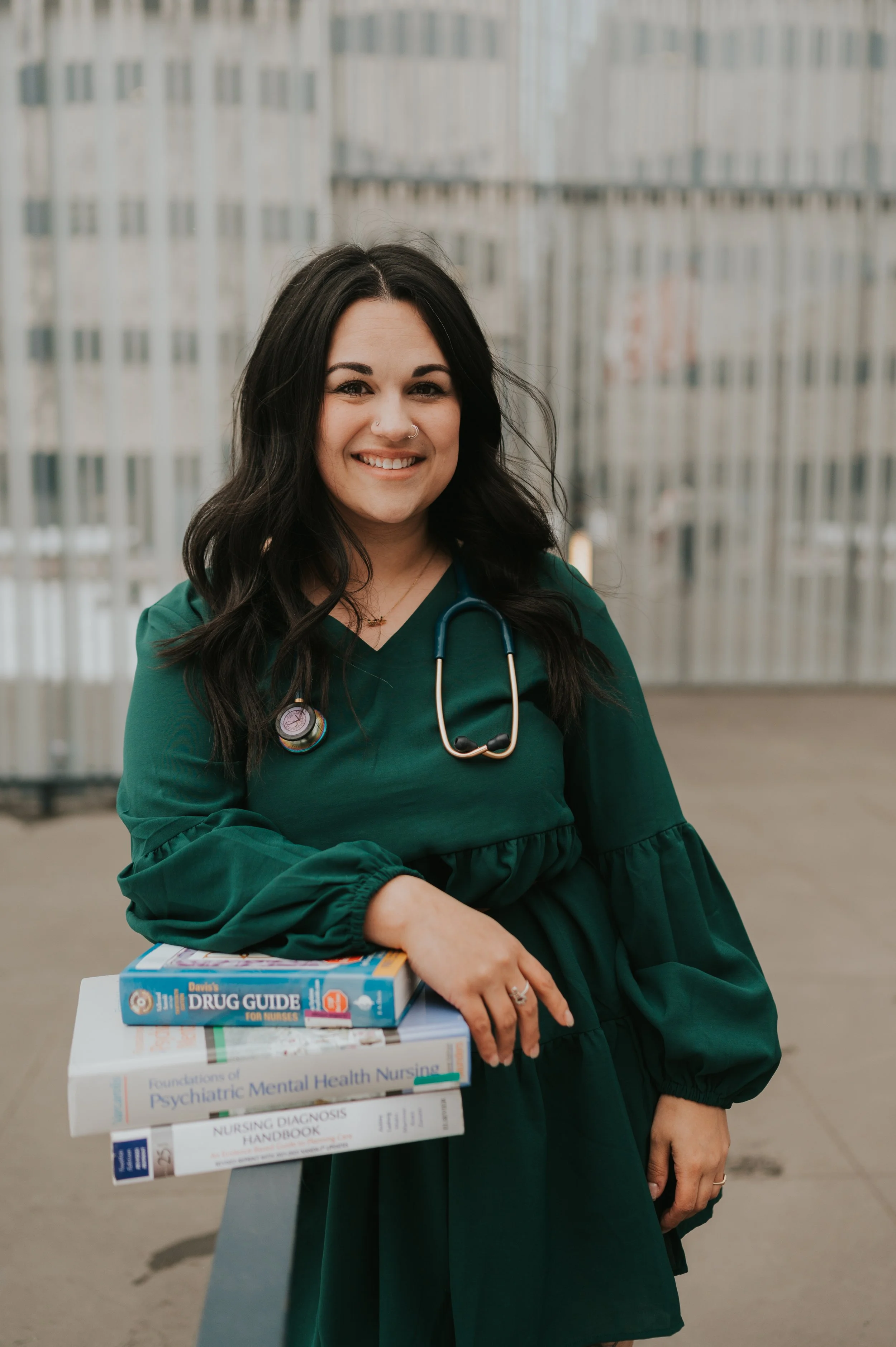 nurse holding textbooks