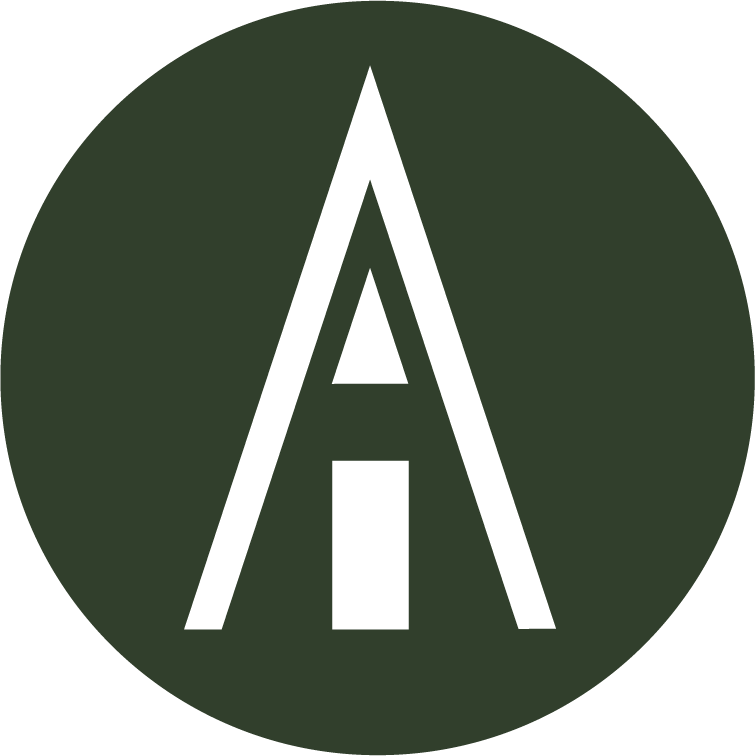 A circular logo with a black tent-like triangular shape and a vertical rectangle inside it, all on a dark green background.