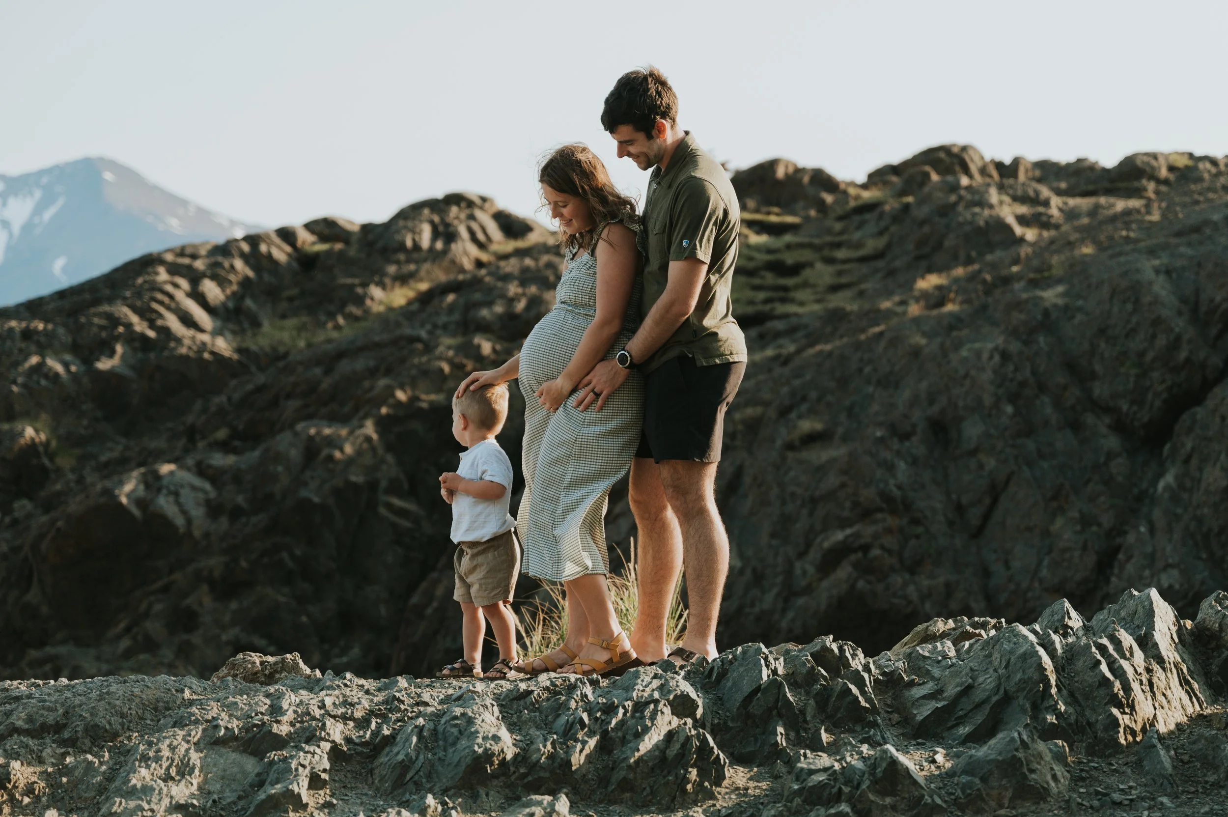 maternity photo of family with toddler