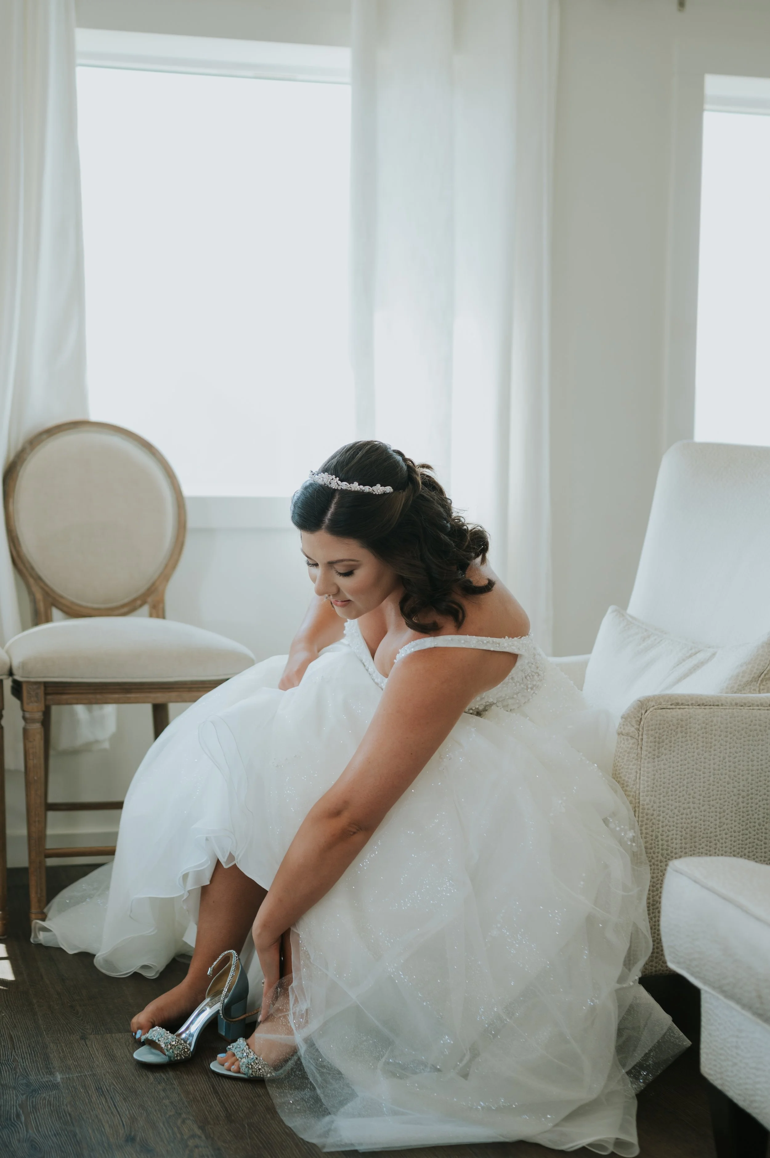 bride putting on shoes