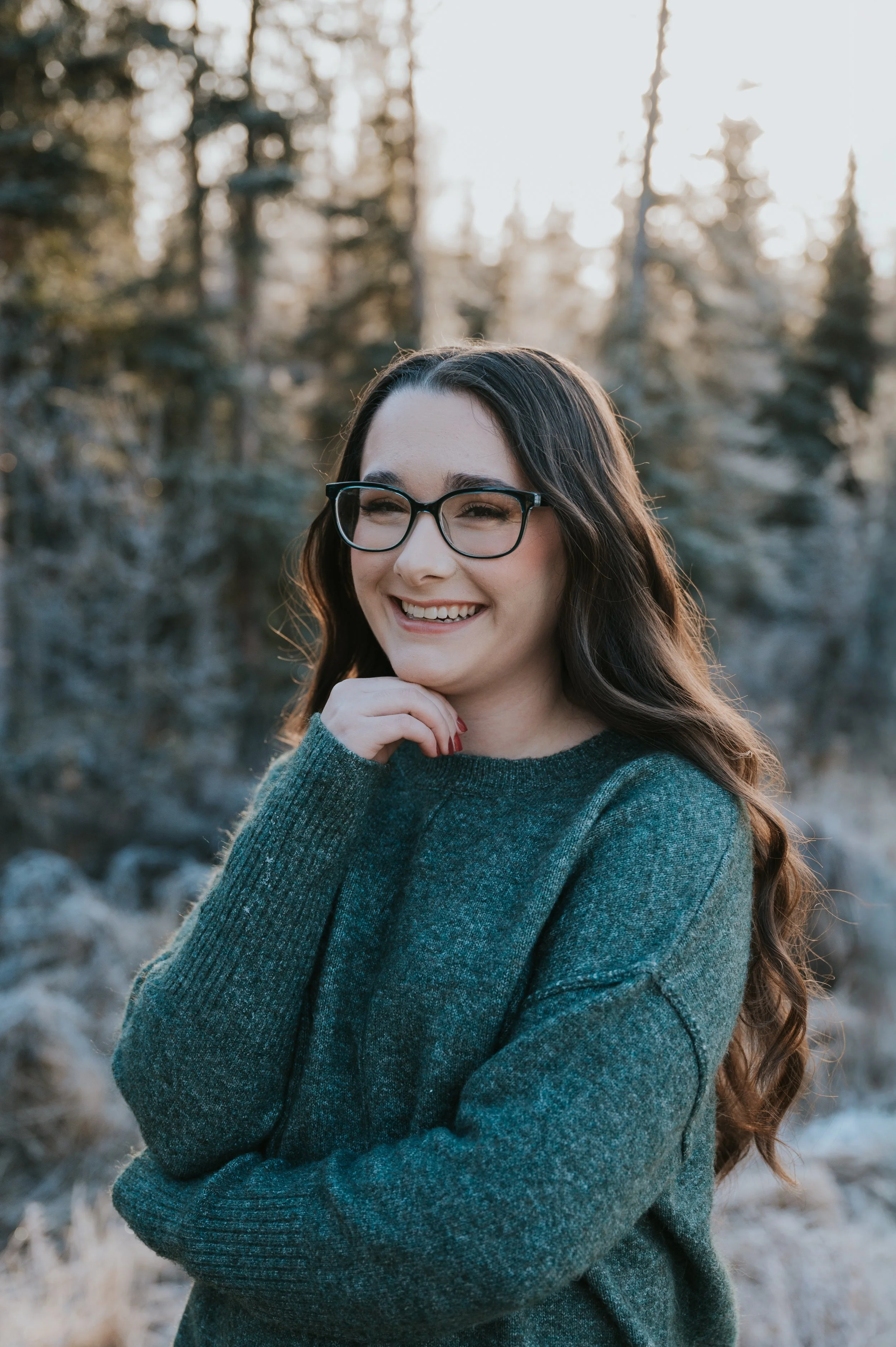 girl smiling at camera in cold