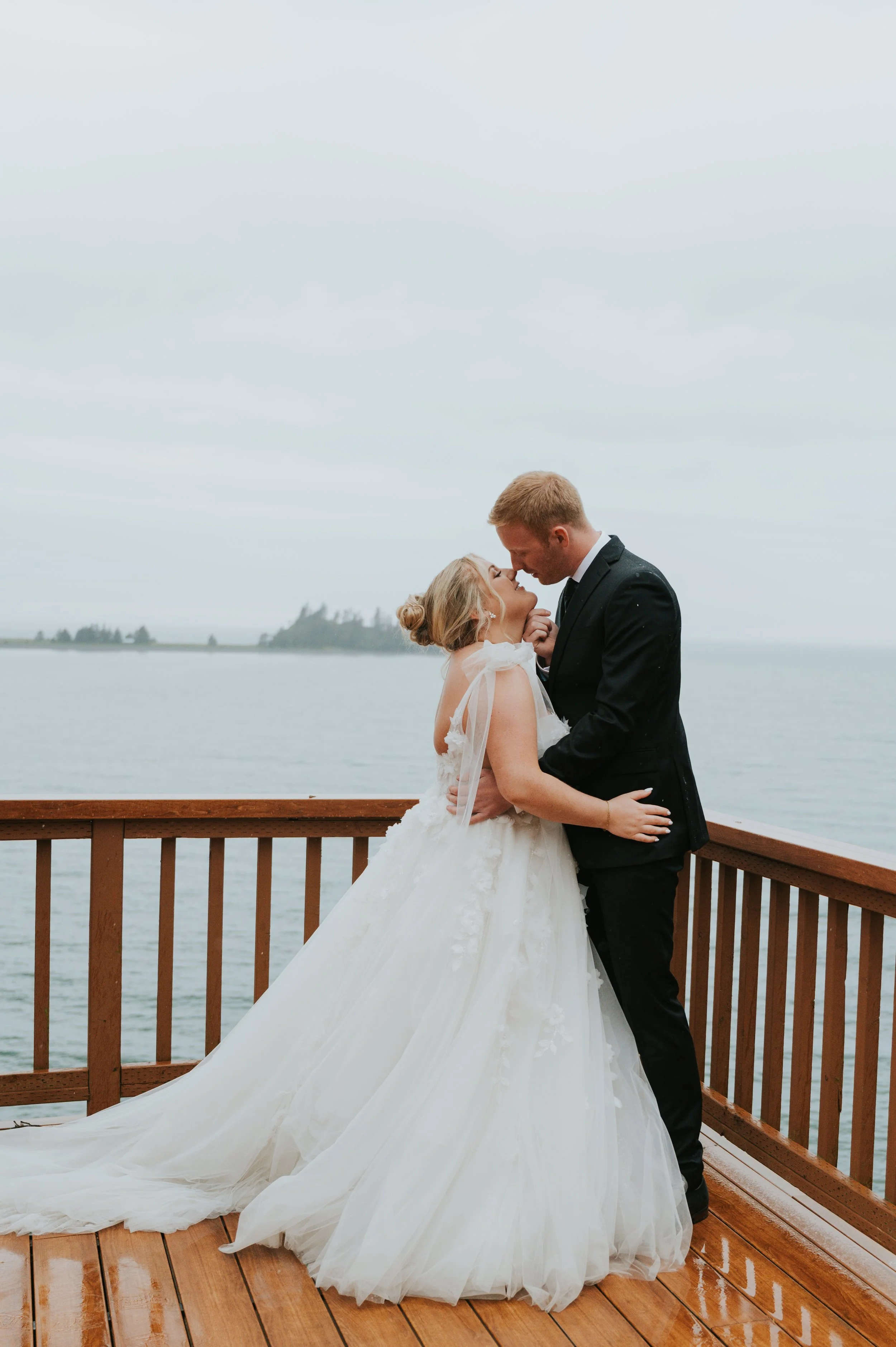 bride and groom touching noses