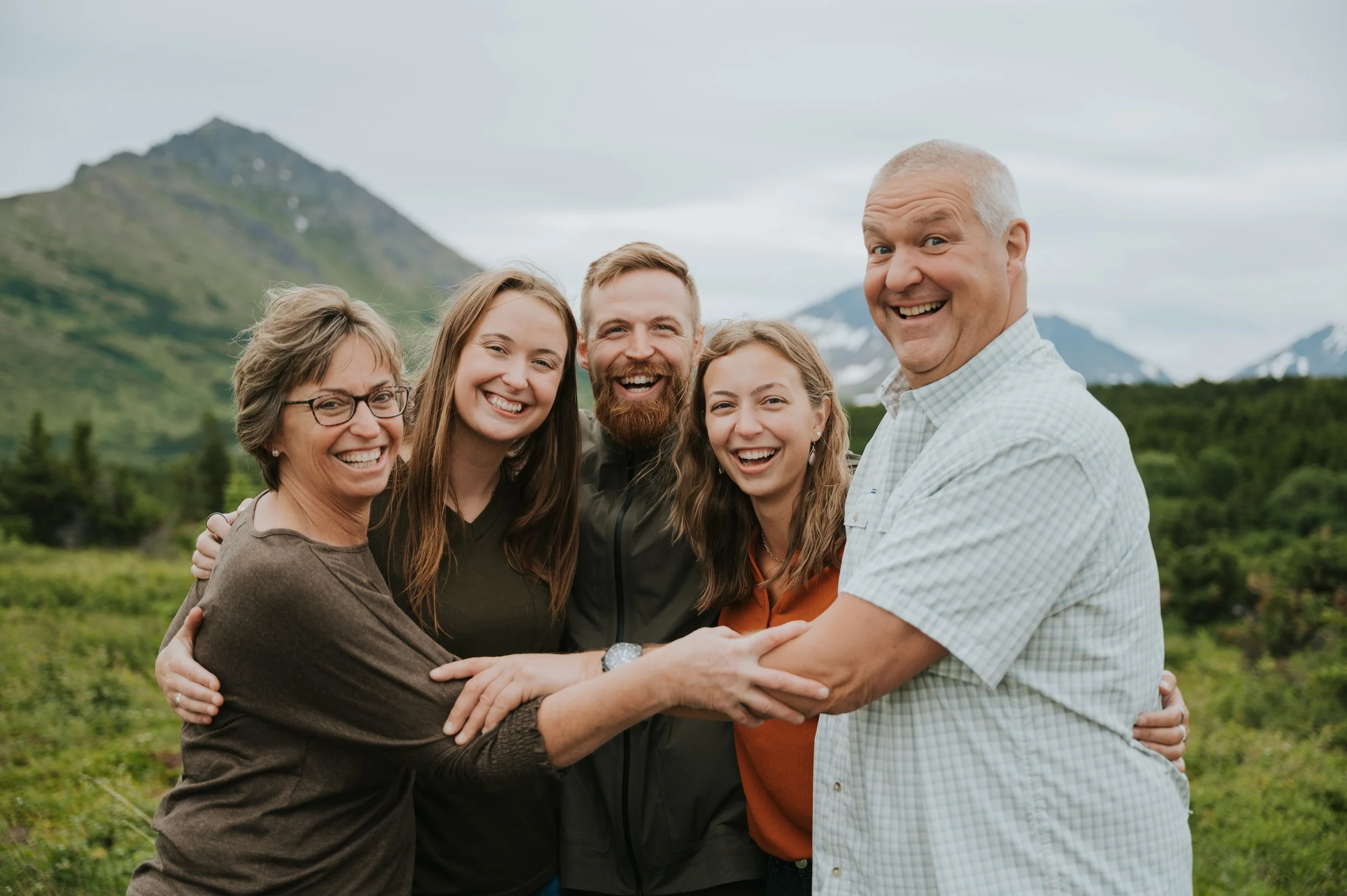 big family group hug