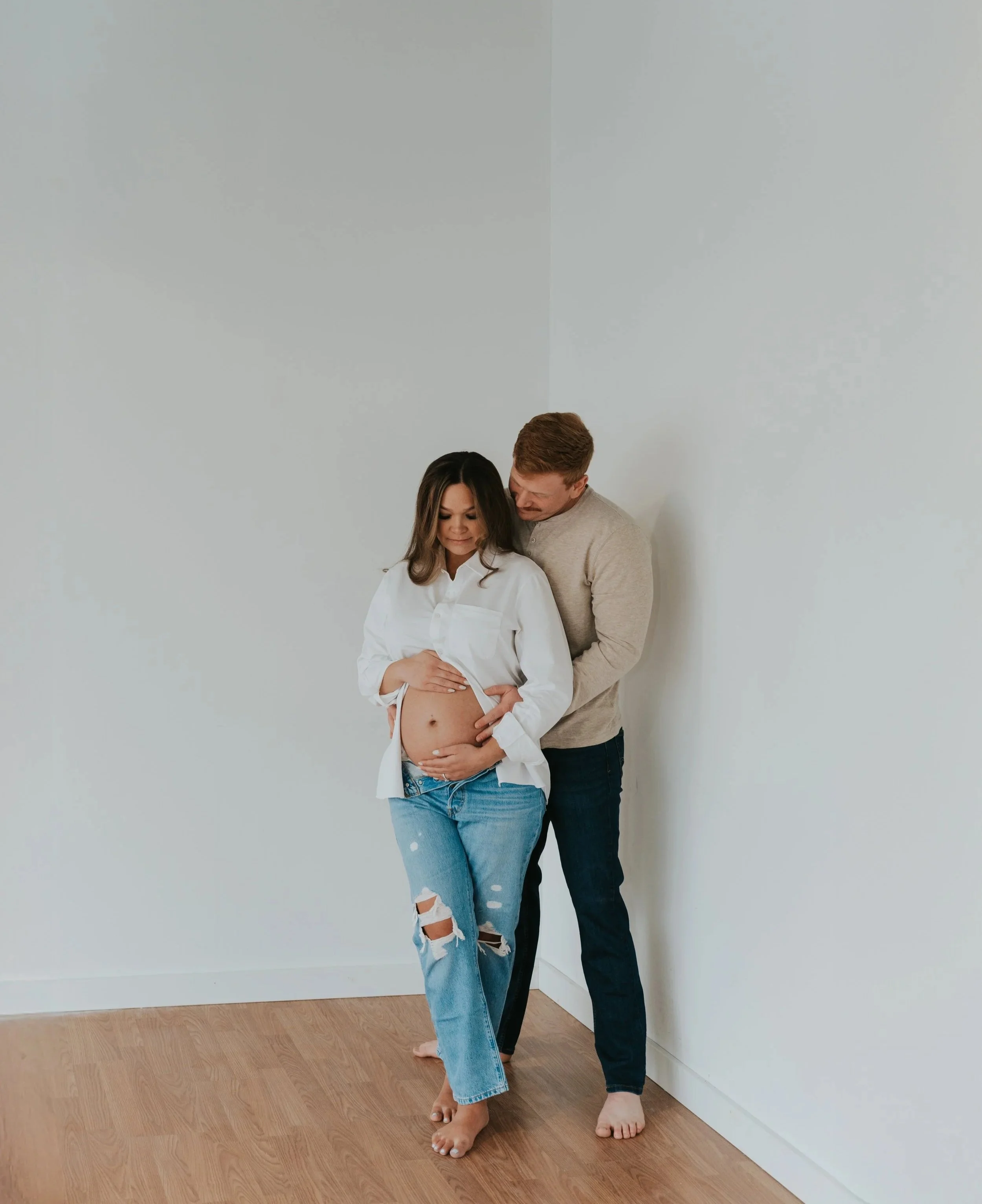 pregnant mom and dad in studio maternity session