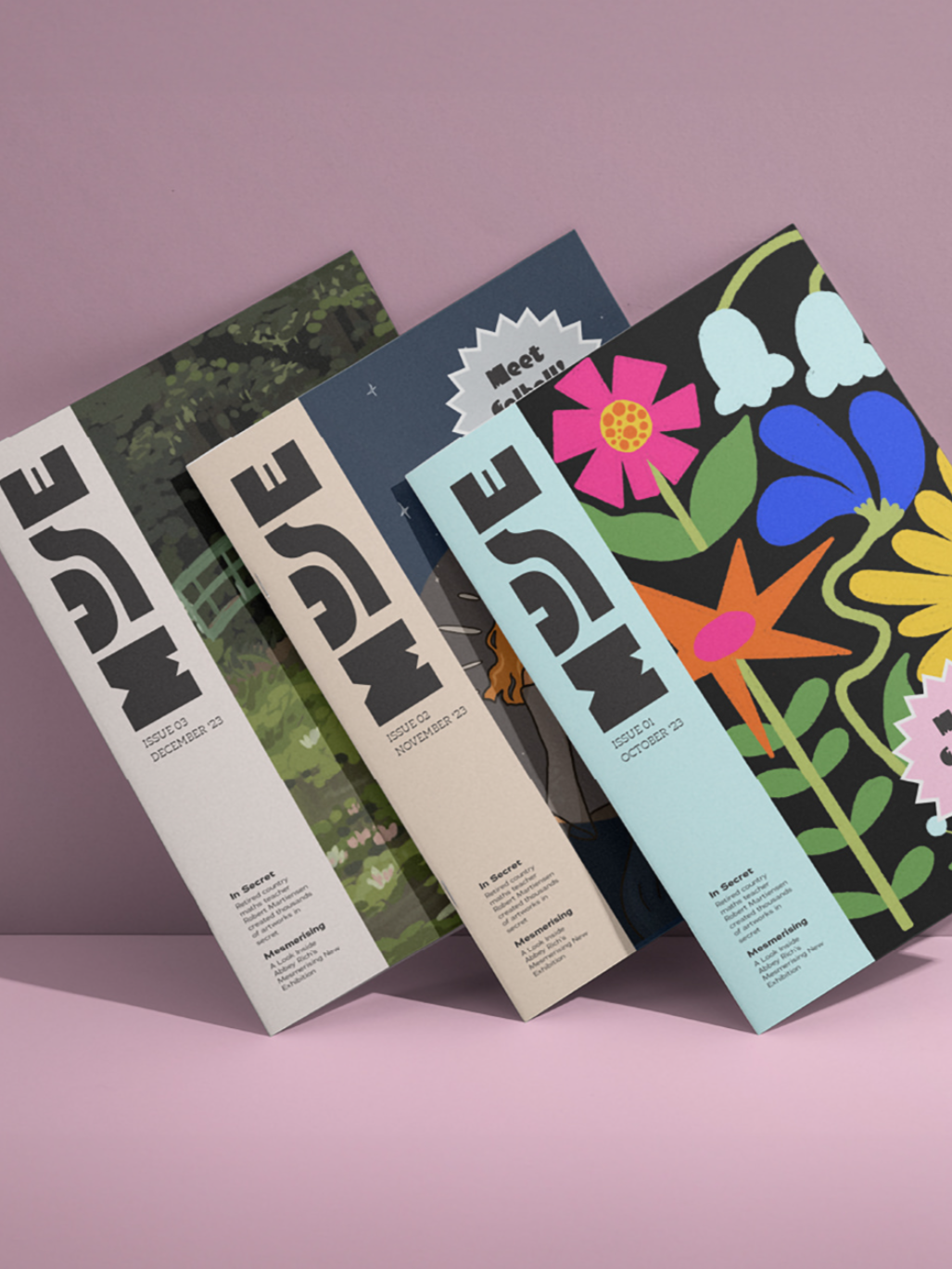 Three issues of a magazine with colorful floral and nature-themed covers, displayed against a pink background.