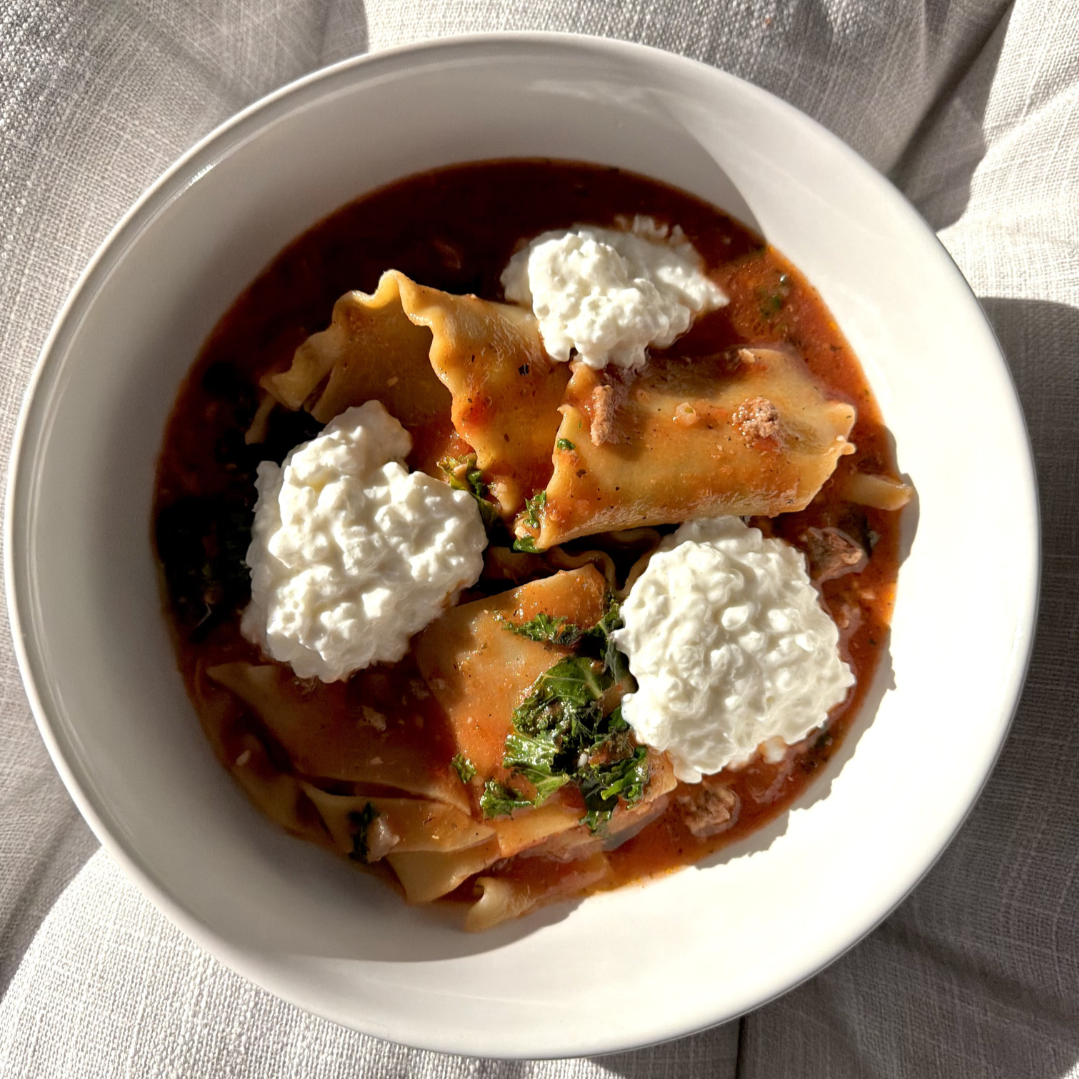 Geometric drawing of an outline square with sections divided by vertical, horizontal, and circle lines.