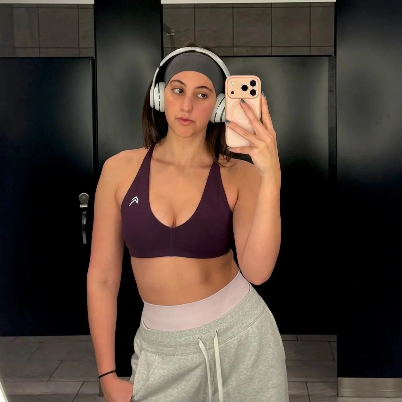 Geometric drawing of an outline square with sections divided by vertical, horizontal, and diagonal lines.