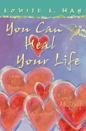 Cover of a book titled 'You Can Heal Your Life' by Louise L. Hay, featuring multiple red and pink hearts with inspirational phrases inside, and a yellow hummingbird near the top.