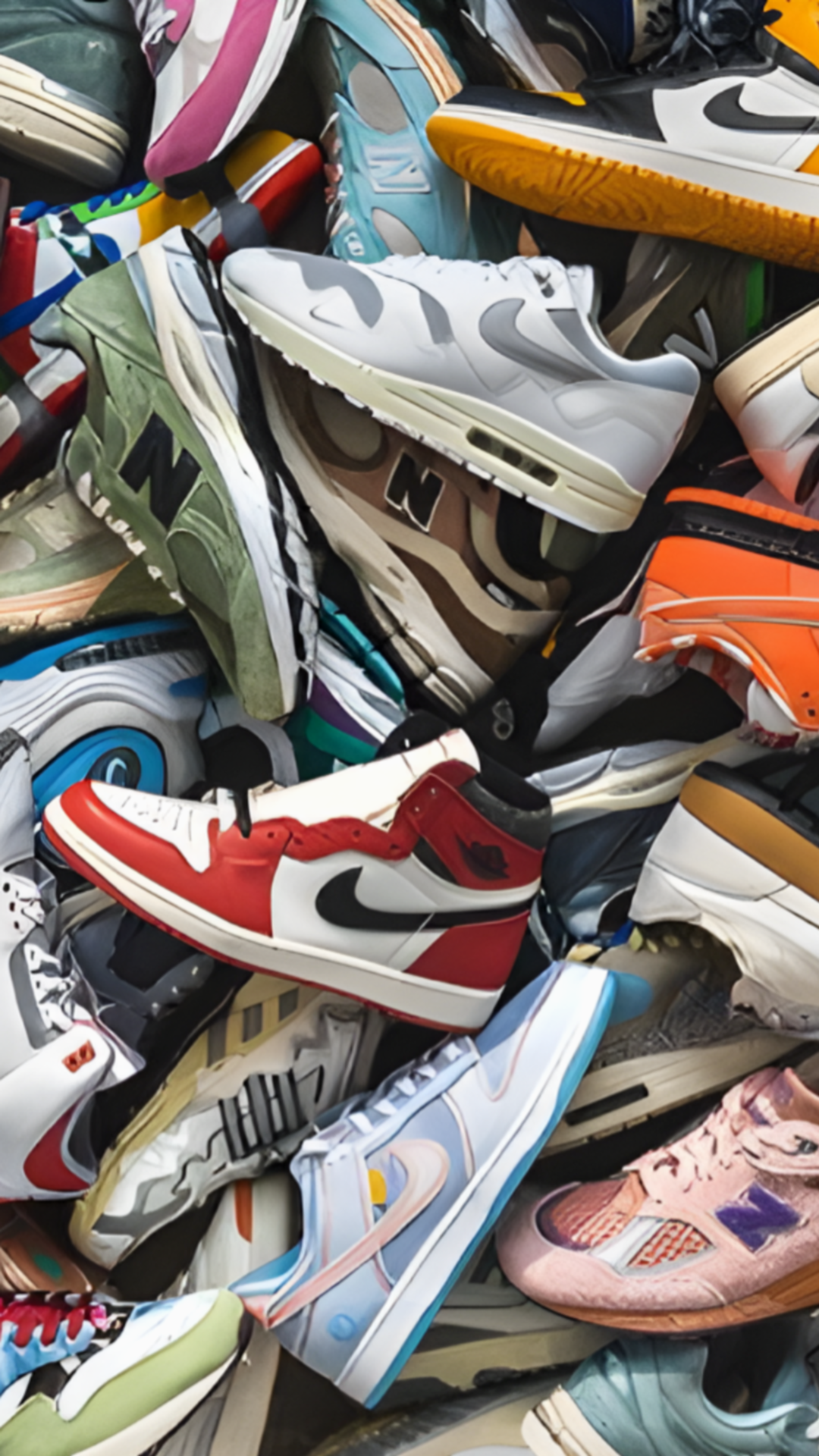 A pile of various sneakers, including Nike Air Jordan and Nike Air Max, in different colors and styles.