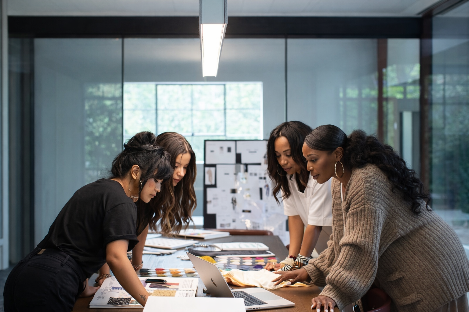 Geometric drawing of an outline square with sections divided by vertical, horizontal, and diagonal lines.