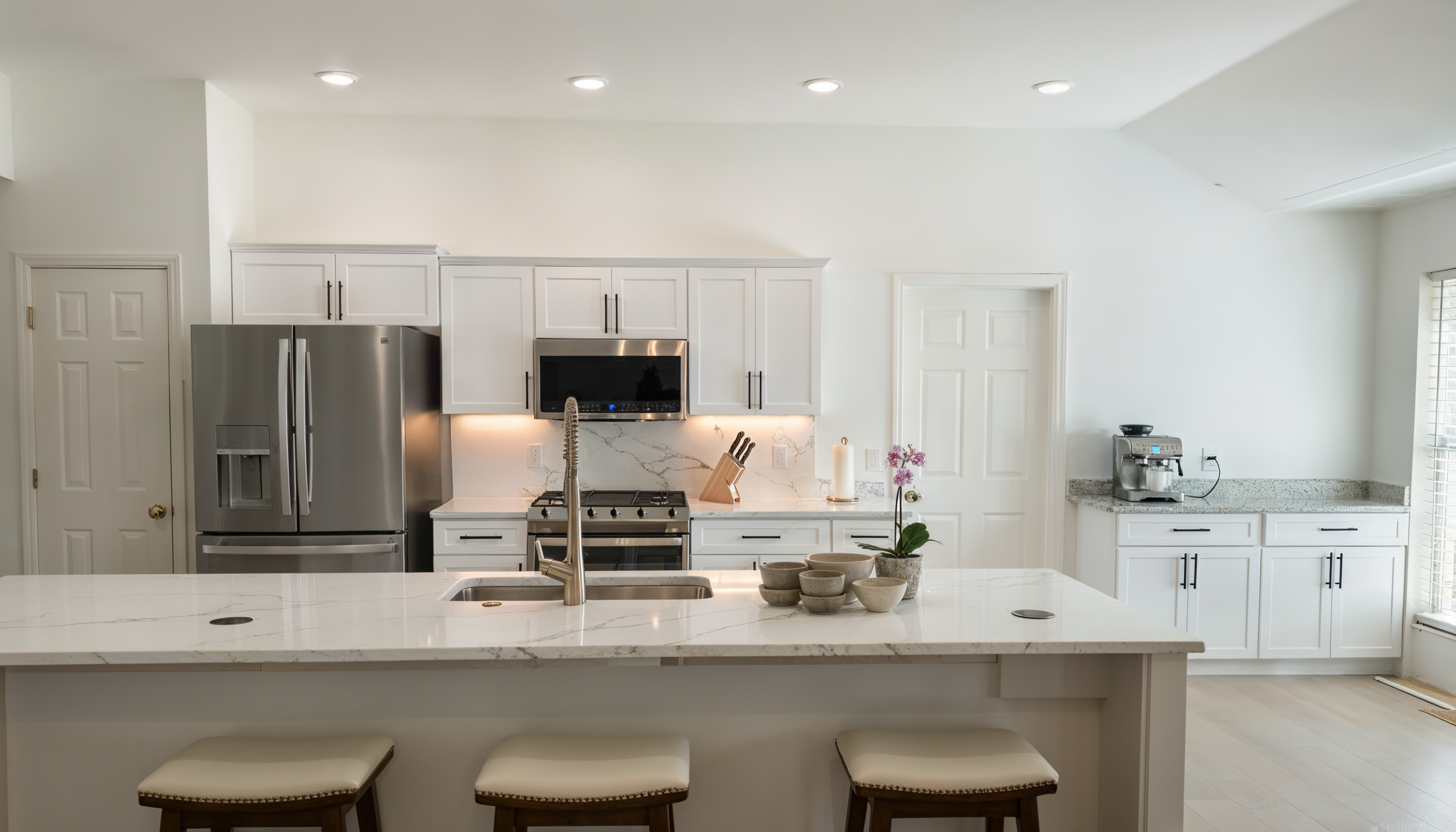 A kitchen with a large island 