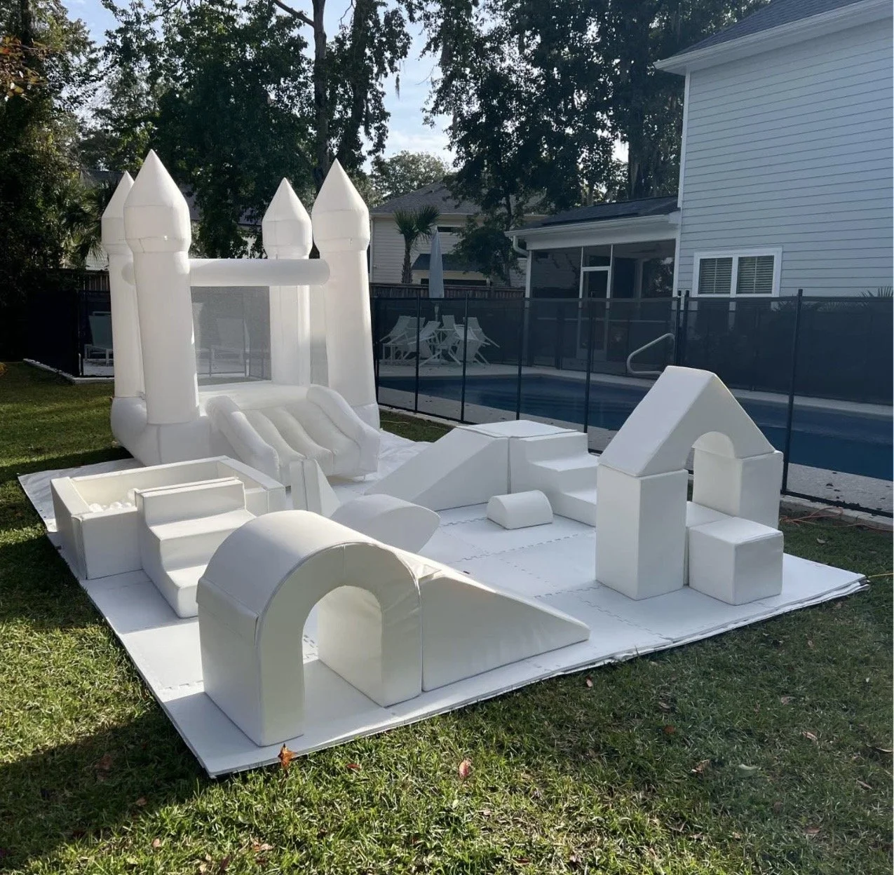 White Soft Play Rental in Charleston, SC. White Toddler Bounce House White Ball Pit Foam Climbers for a First Birthday Party in Charleston, SC