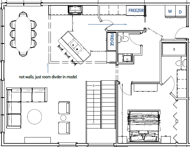 Floor plan of a living room with furniture, including a sofa, coffee table, and TV, with a staircase labeled 'UP' on the right side, and an arrow indicating north.