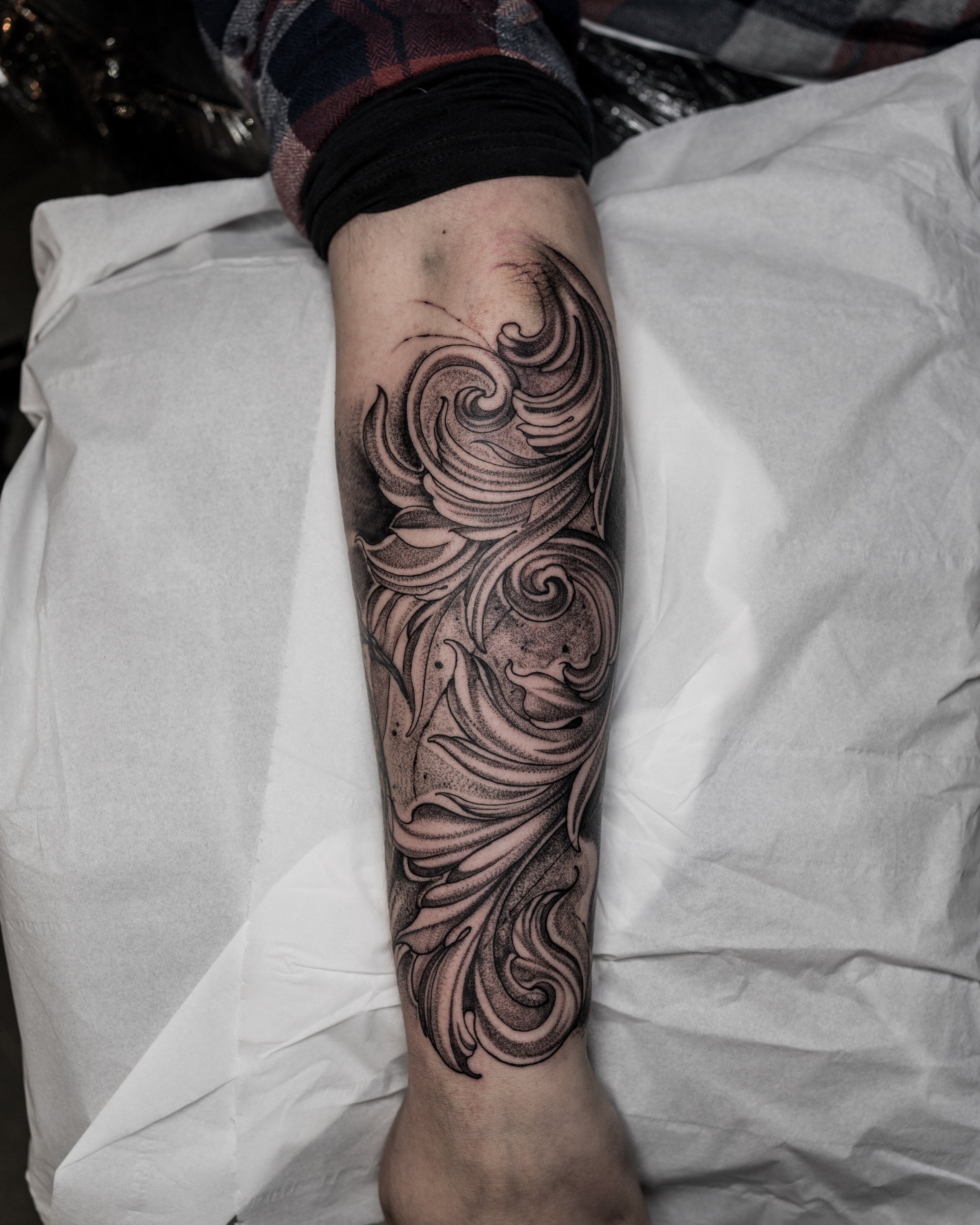 Black and grey tattoo of filigree flowing patterns on arm by Jay C Tattoo, Brighton tattoo artist, UK
