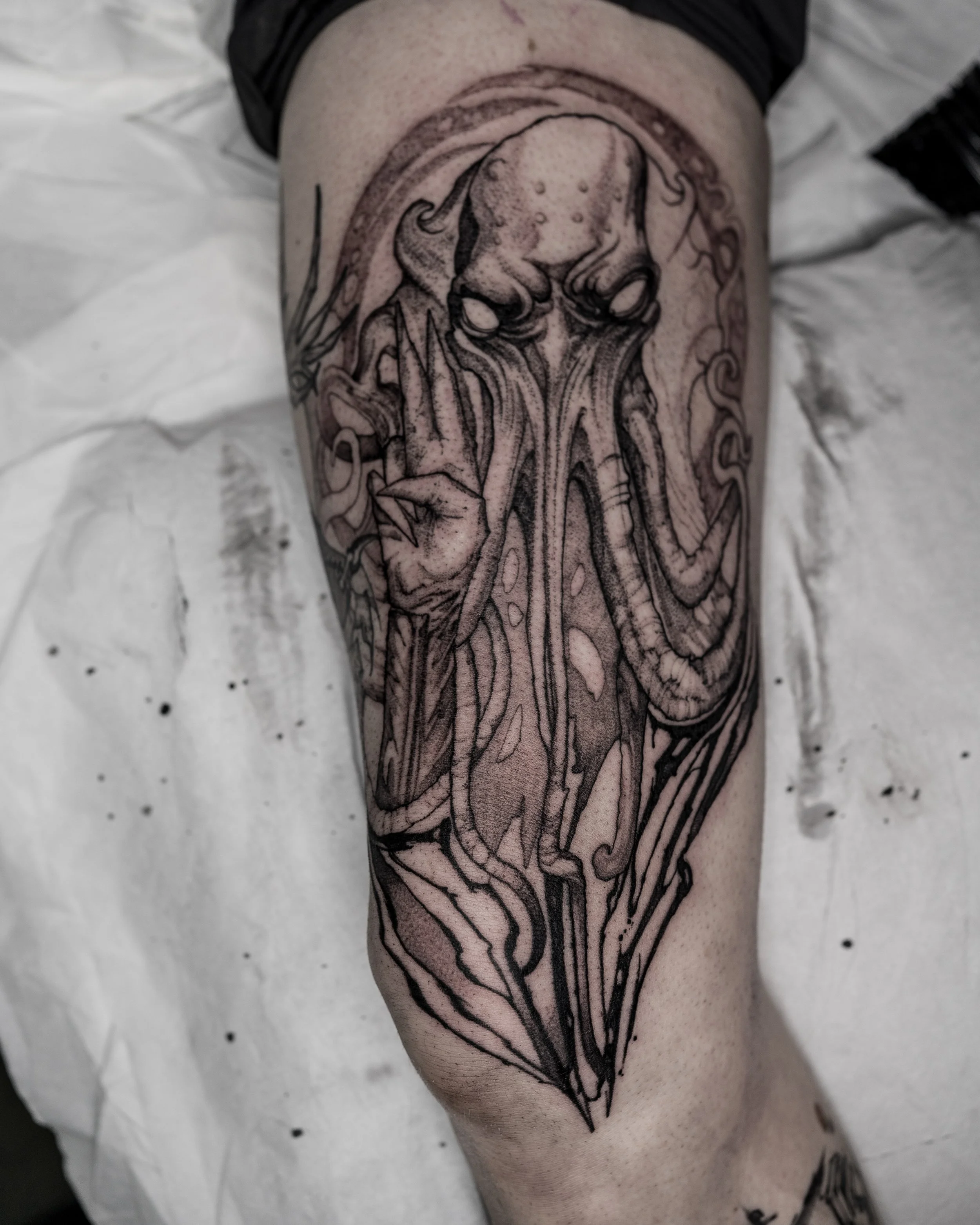 Black and grey Lilith tattoo with elongated tentacles on thigh by Jay C Tattoo, Brighton tattoo artist, UK
