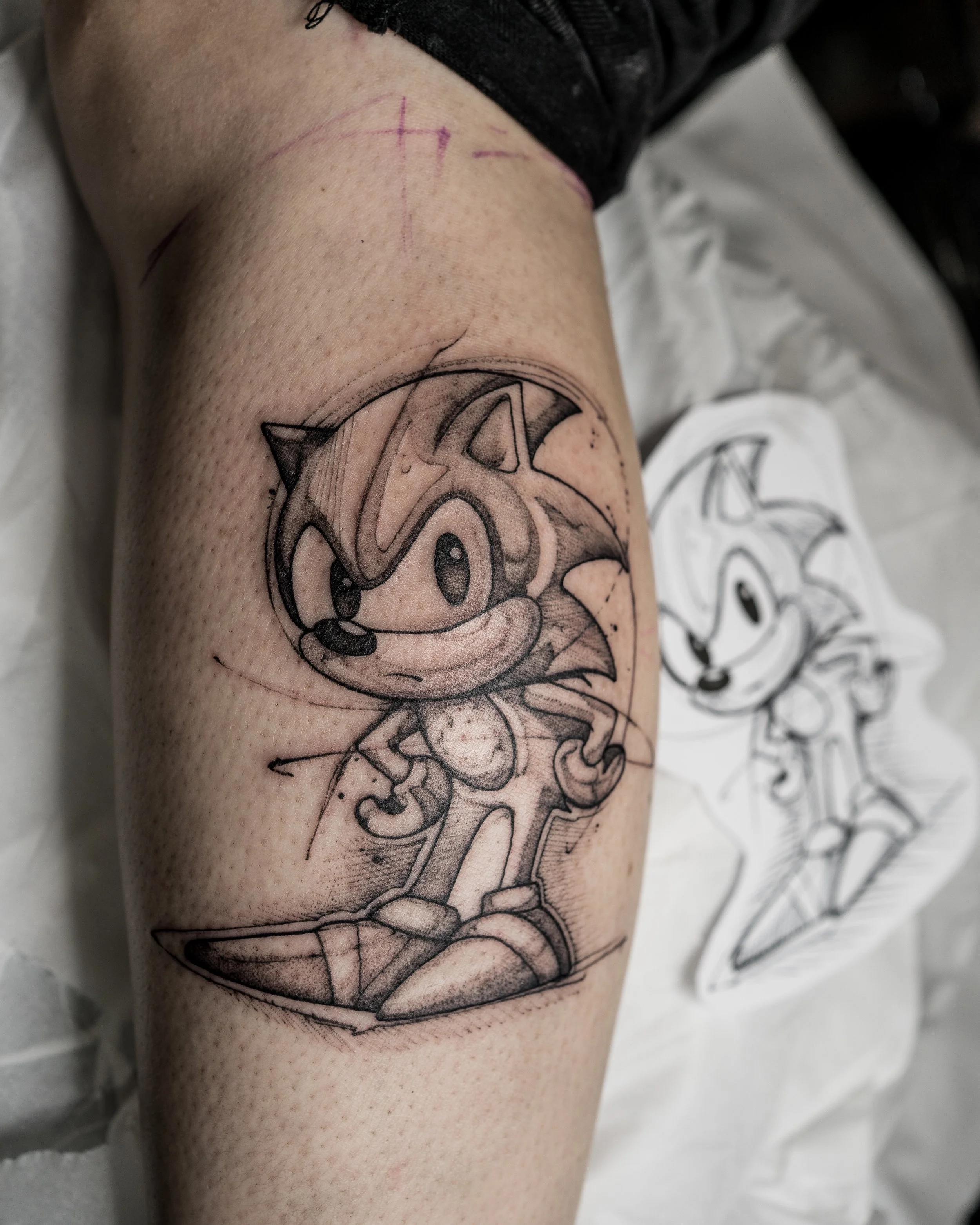 Black and grey Sonic the Hedgehog tattoo sketch on calf with original drawing by Jay C Tattoo, Brighton and Hove tattoo artist, UK
